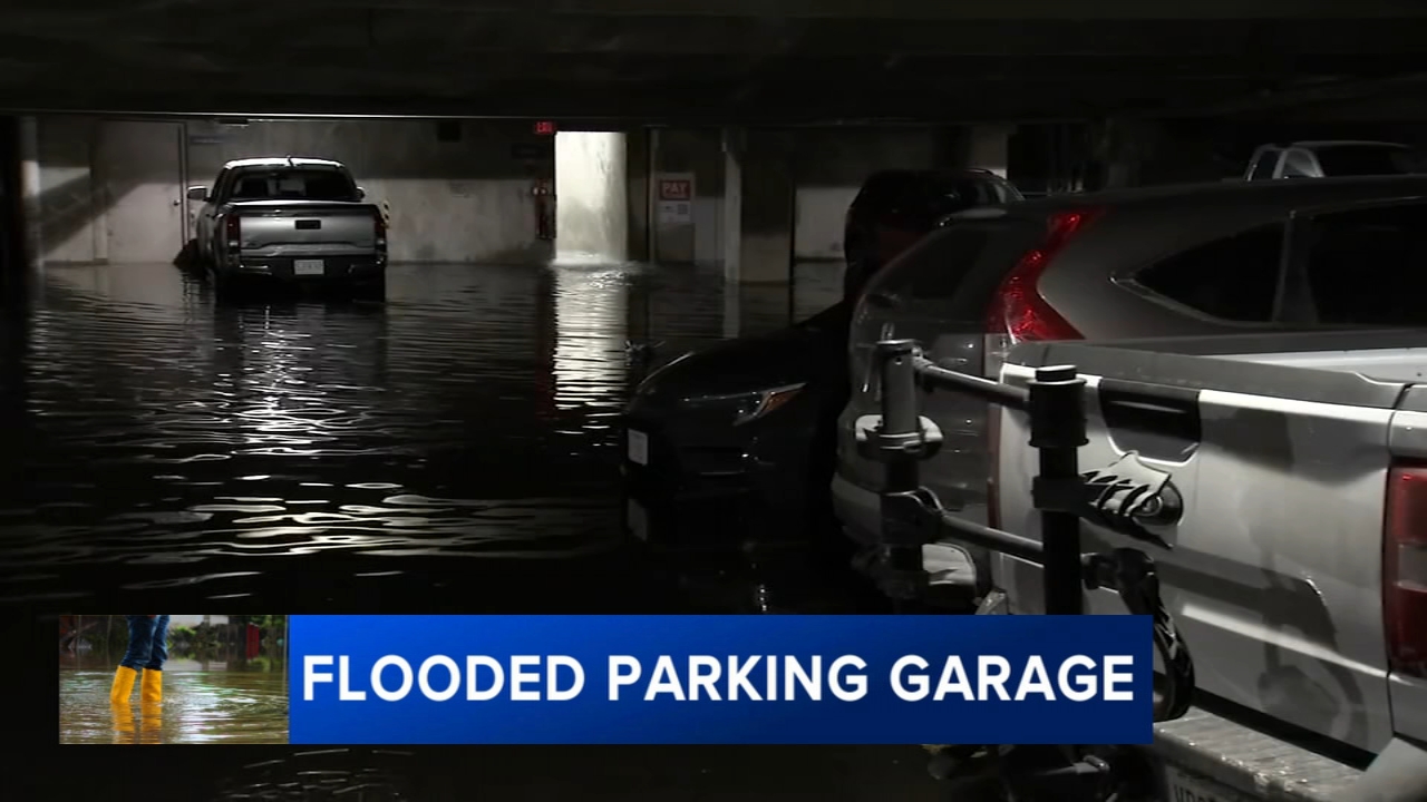 Water floods parking garage in Spring Garden, submerging nearly 20 vehicles