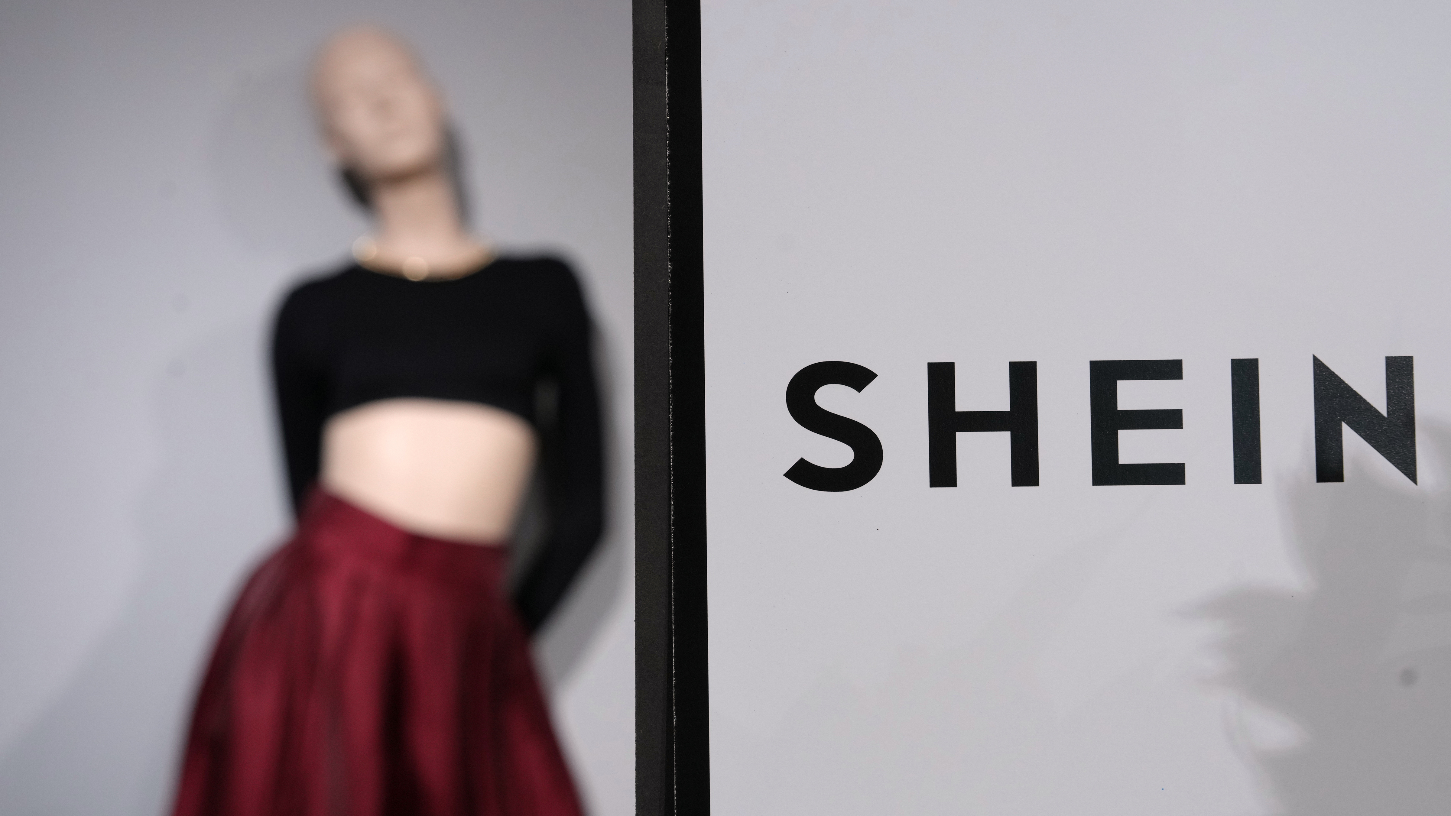 Clothes by Chinese company Shein are seen in the BHV (Bazar de l'Hotel de Ville) department store, Tuesday, Nov. 4, 2025 in Paris.