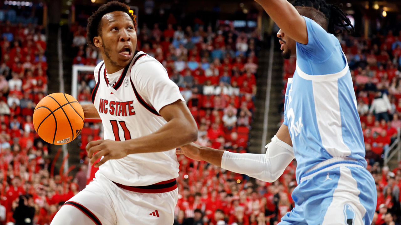 N.C. State Quadir Copeland drives the ball around North Carolina's Isaiah Denis on Tuesday in Raleigh