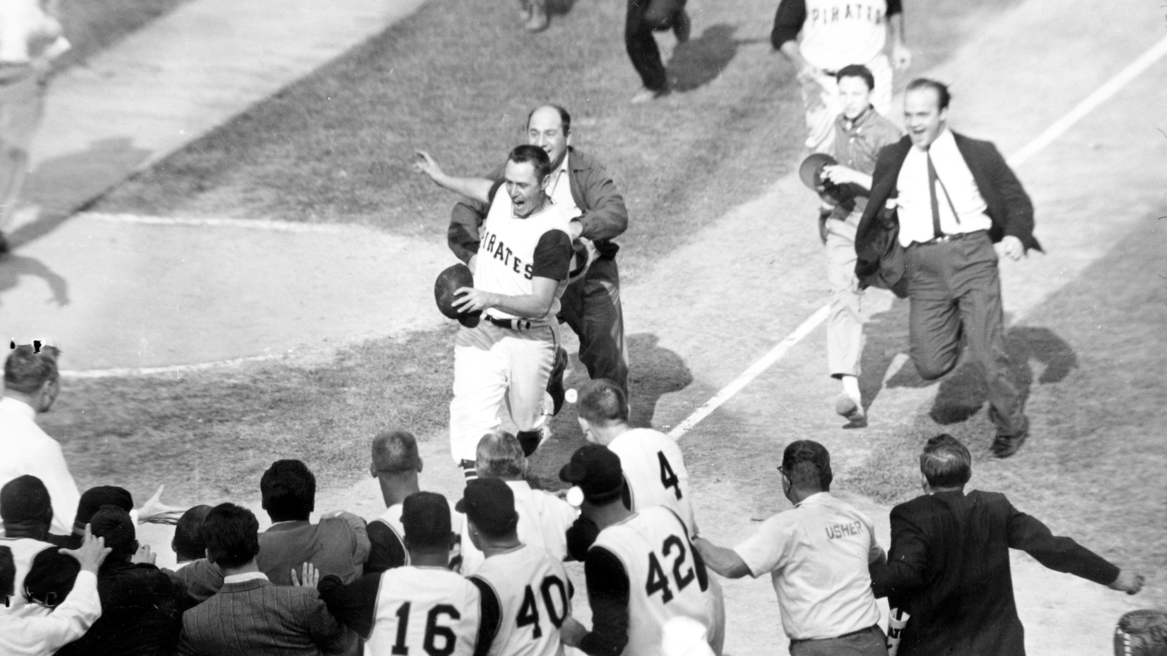 FILE - Pittsburgh Pirates second baseman Bill Mazeroski comes home after hitting a ninth inning home run to win Game 7 of baseball's World Series in Pittsburgh, Pa., Oct. 13, 1960.