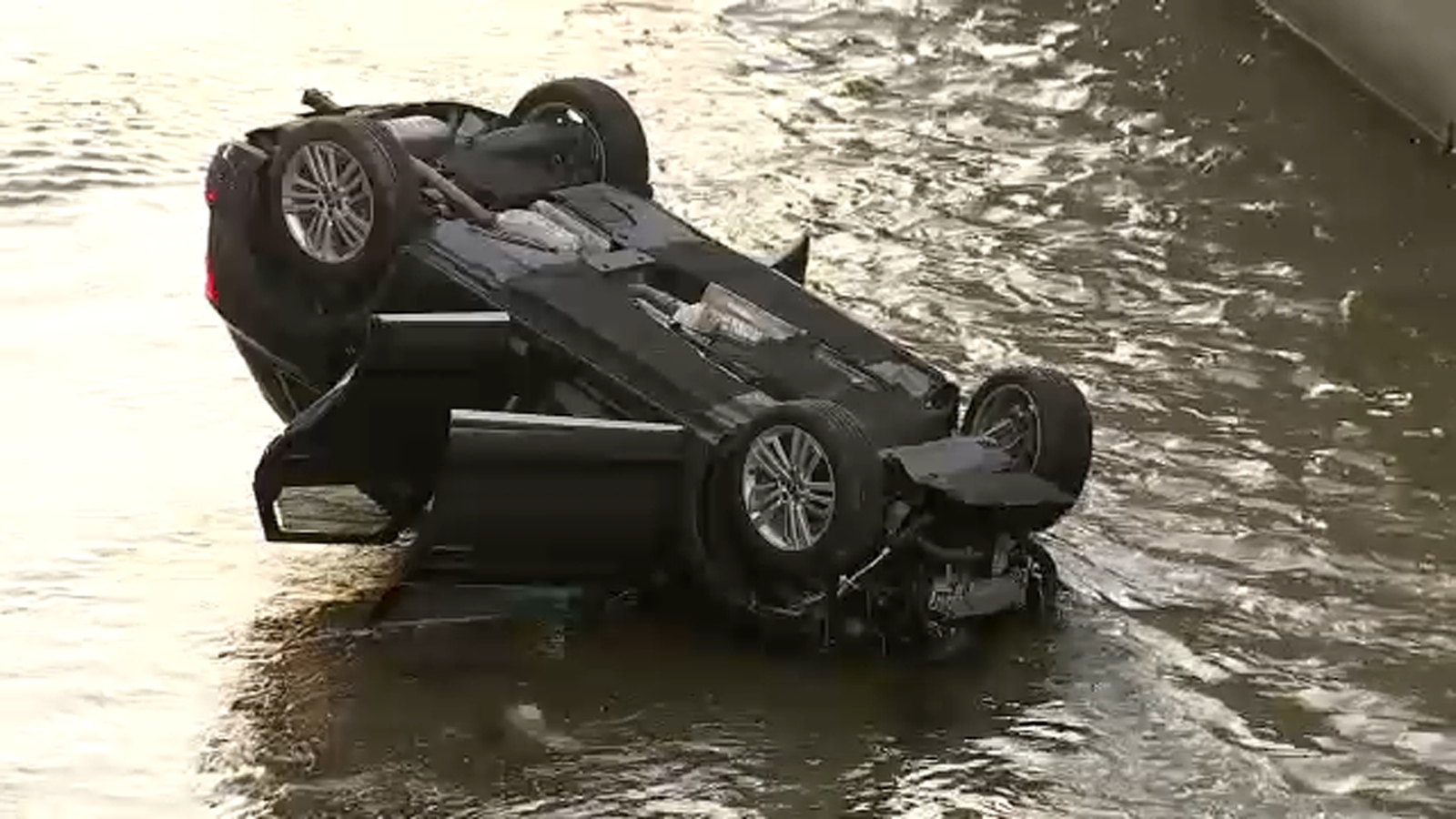 SUV crashes, overturns in LA River in Valley Village area, firefighters say