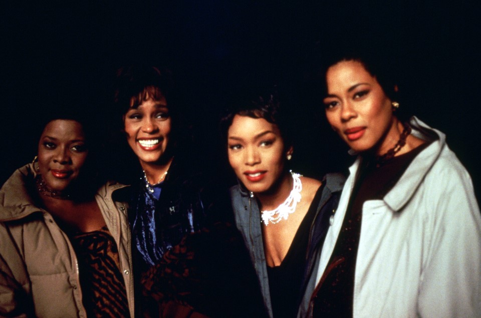 Loretta Devine, Whitney Houston, Angela Bassett and Lela Rochon behind the scenes on the "Waiting to Exhale" set shooting in the desert at night.