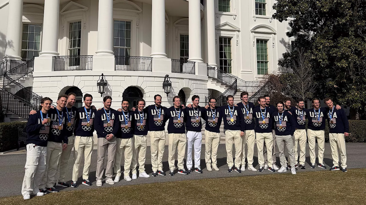 The USA men's Olympic ice hockey team pose with their gold medals at the White House in Washington, Feb. 24, 2026.