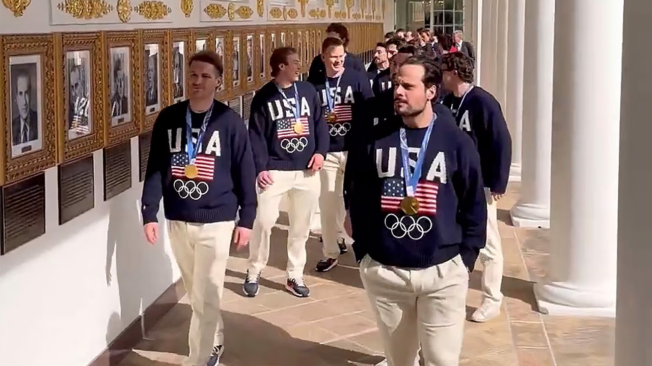 USA men's Olympic ice hockey players Matthew Tkachuk and Auston Mathews lead their teammates along the colonnade at the White House in Washington, Feb. 24, 2026.