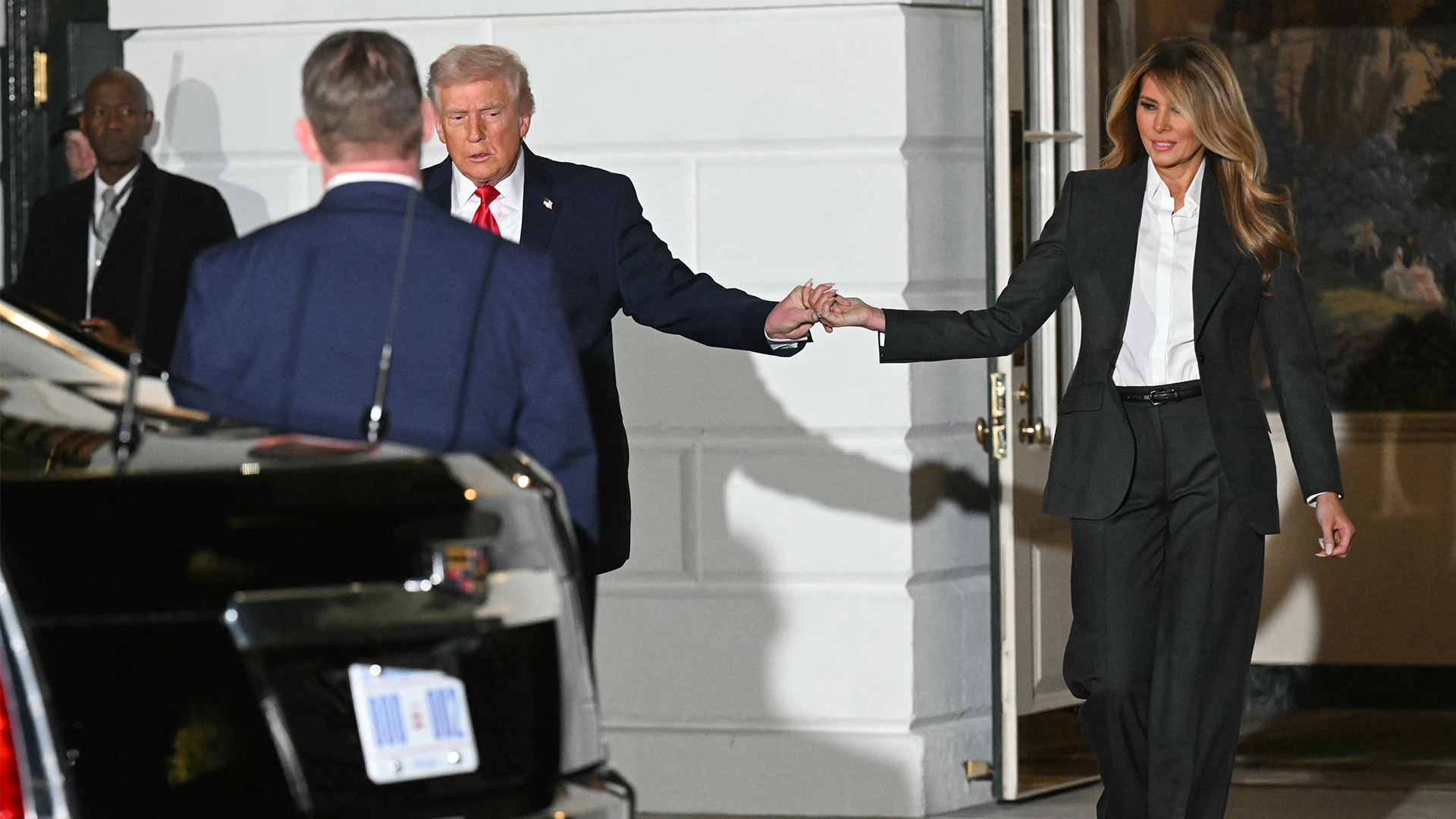 President Donald Trump and First Lady Melania Trump head towards the U.S. Capitol before he delivers his State of the Union address in Washington, DC, on Feb. 24, 2026.