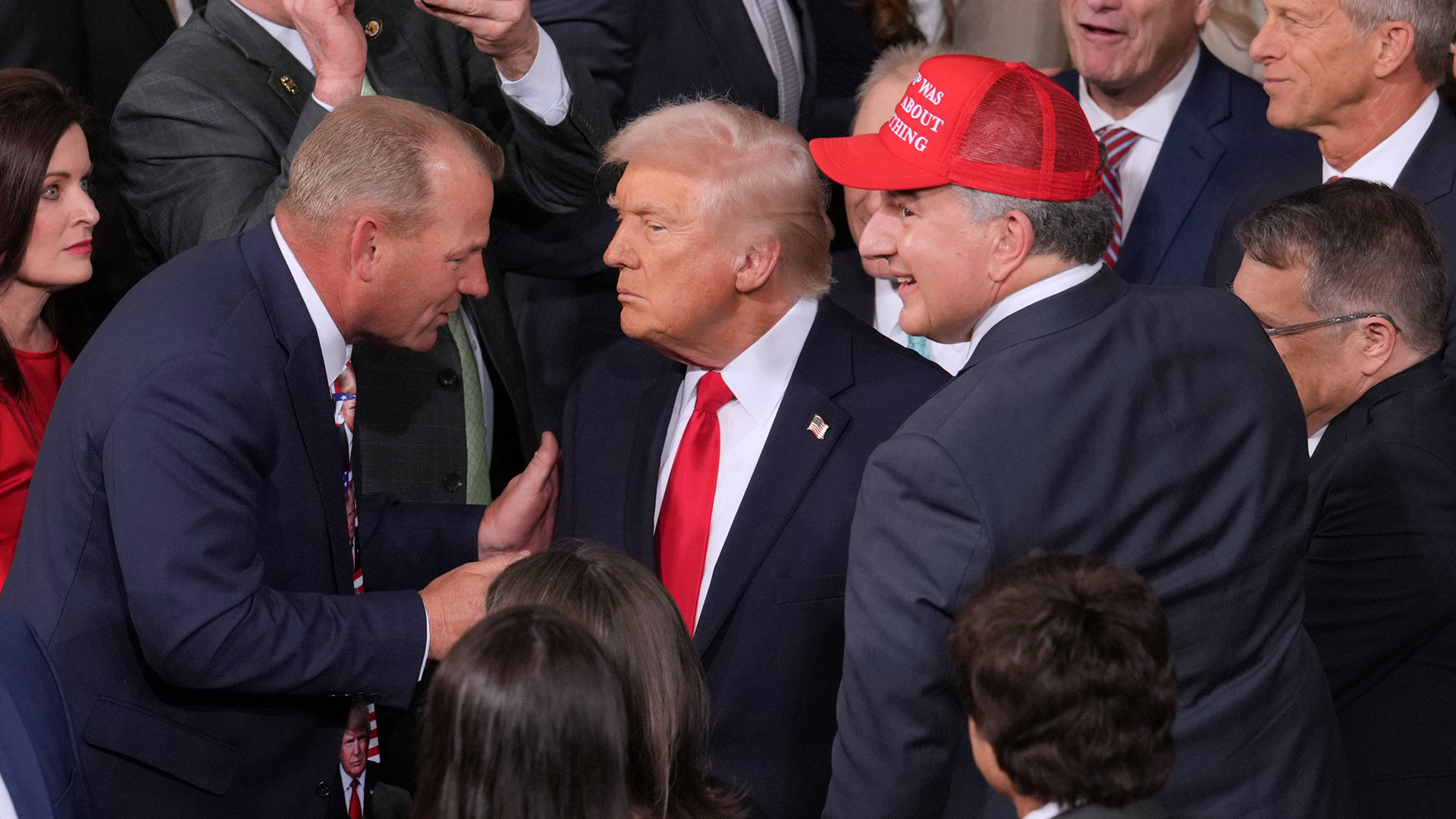 President Donald Trump is greeted as he walks into the House Chamber to give his State of the Union at the Capitol in Washington, DC, on Feb. 24, 2026.