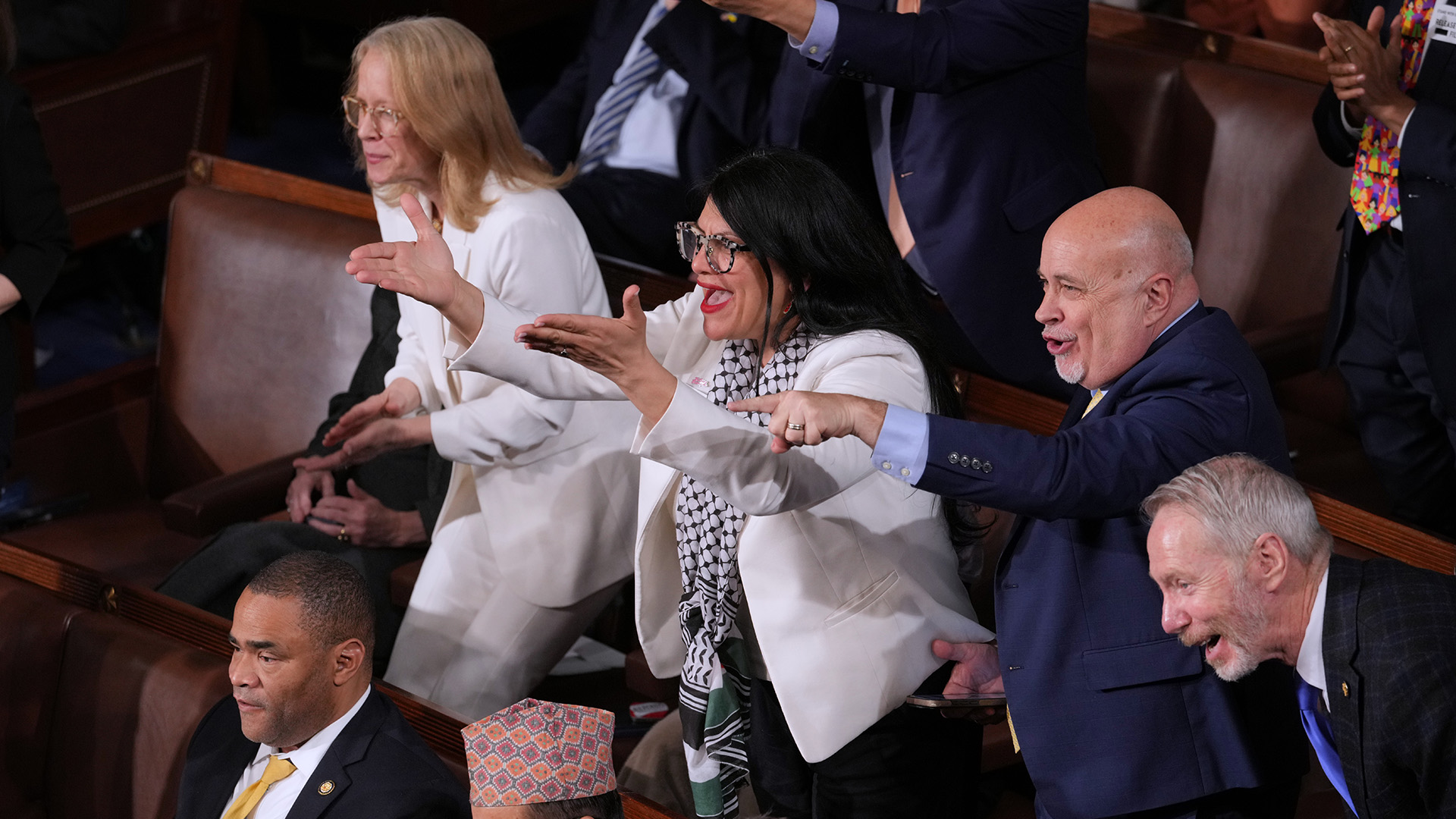 Rep. Rashida Tlaib, D-Mich., and other Democratic members, react as President Donald Trump gives his State of the Union address at the Capitol in Washington on Feb. 24, 2026.