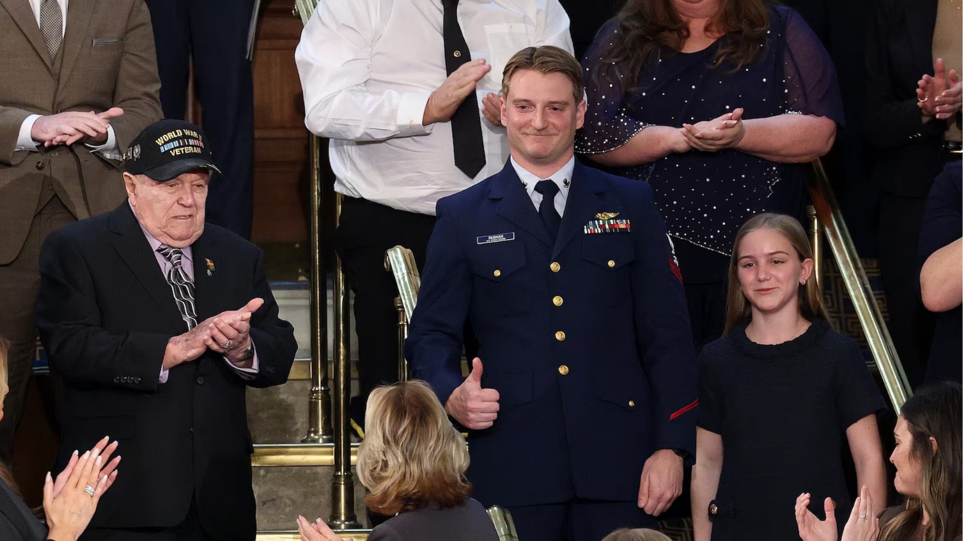 U.S. Coast Guard Petty Officer 3rd Class Scott Ruskan is honored as U.S. President Donald Trump delivers his State of the Union address during a Joint Session of Congress at the U.S. Capitol on Feb. 24, 2026, in Washington, D.C.