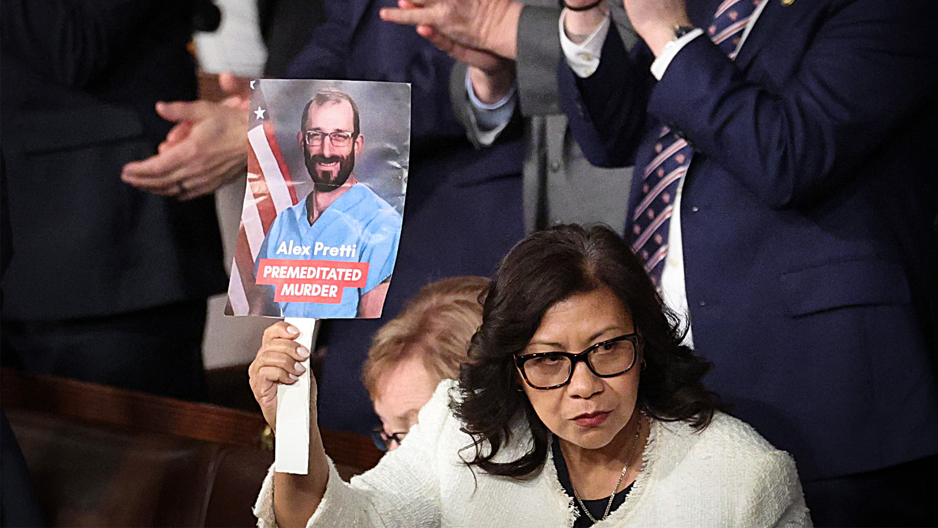 Rep. Norma Torres (D- CA) holds up a photo of Minnesota shooting victim Alex Pretti during President Donald Trump's State of the Union address on Feb. 24, 2026, in Washington, DC.
