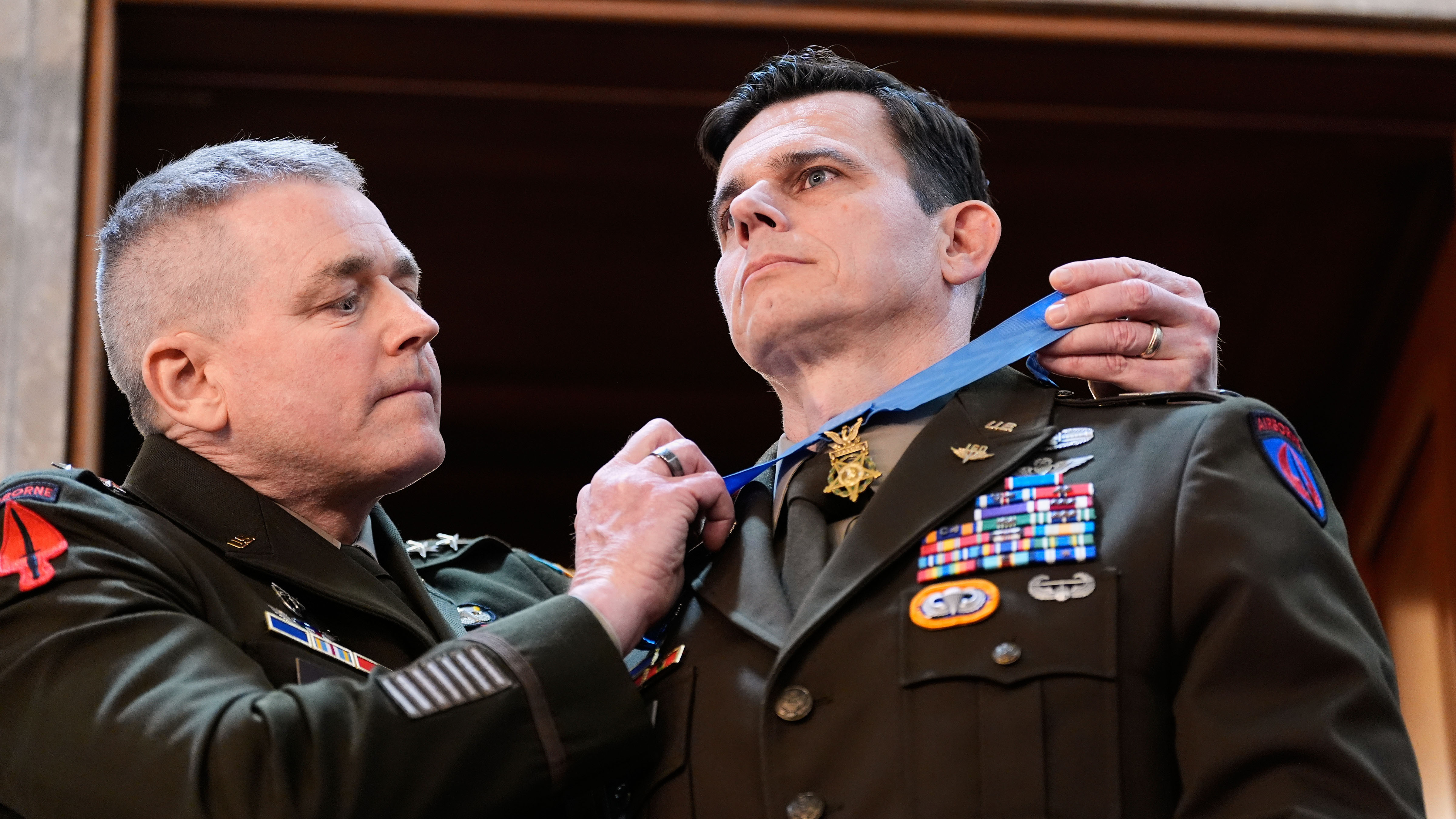 U.S. Army Chief Warrant Officer Eric Slover receives a Medal of Honor during President Donald Trump's State of the Union address to a joint session of Congress in the House chamber at the U.S. Capitol in Washington, Tuesday, Feb. 24, 2026.