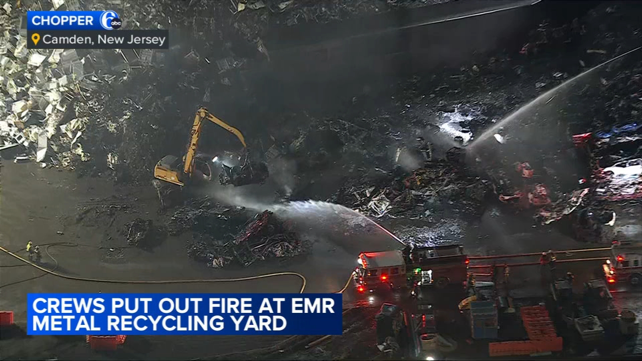 Crews battle fire inside recycling yard in Camden