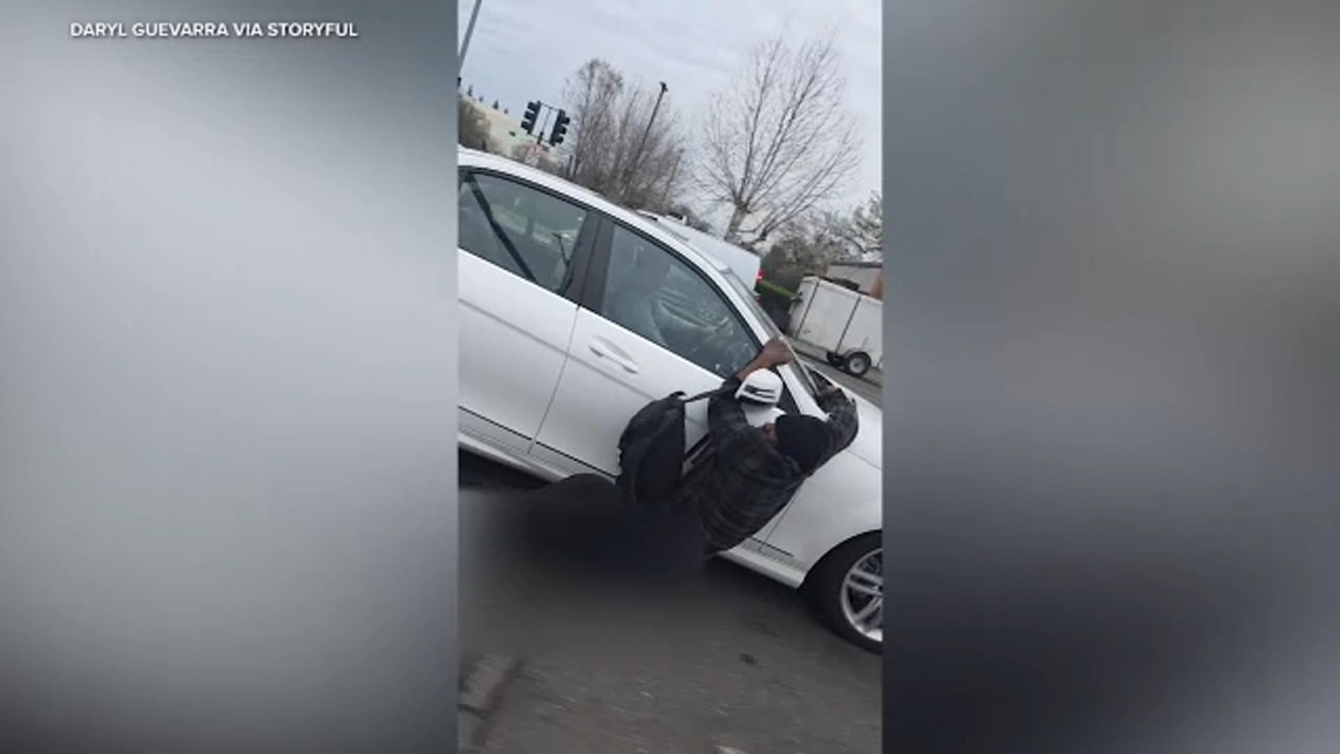 Man arrested after hanging onto moving cars in Sacramento