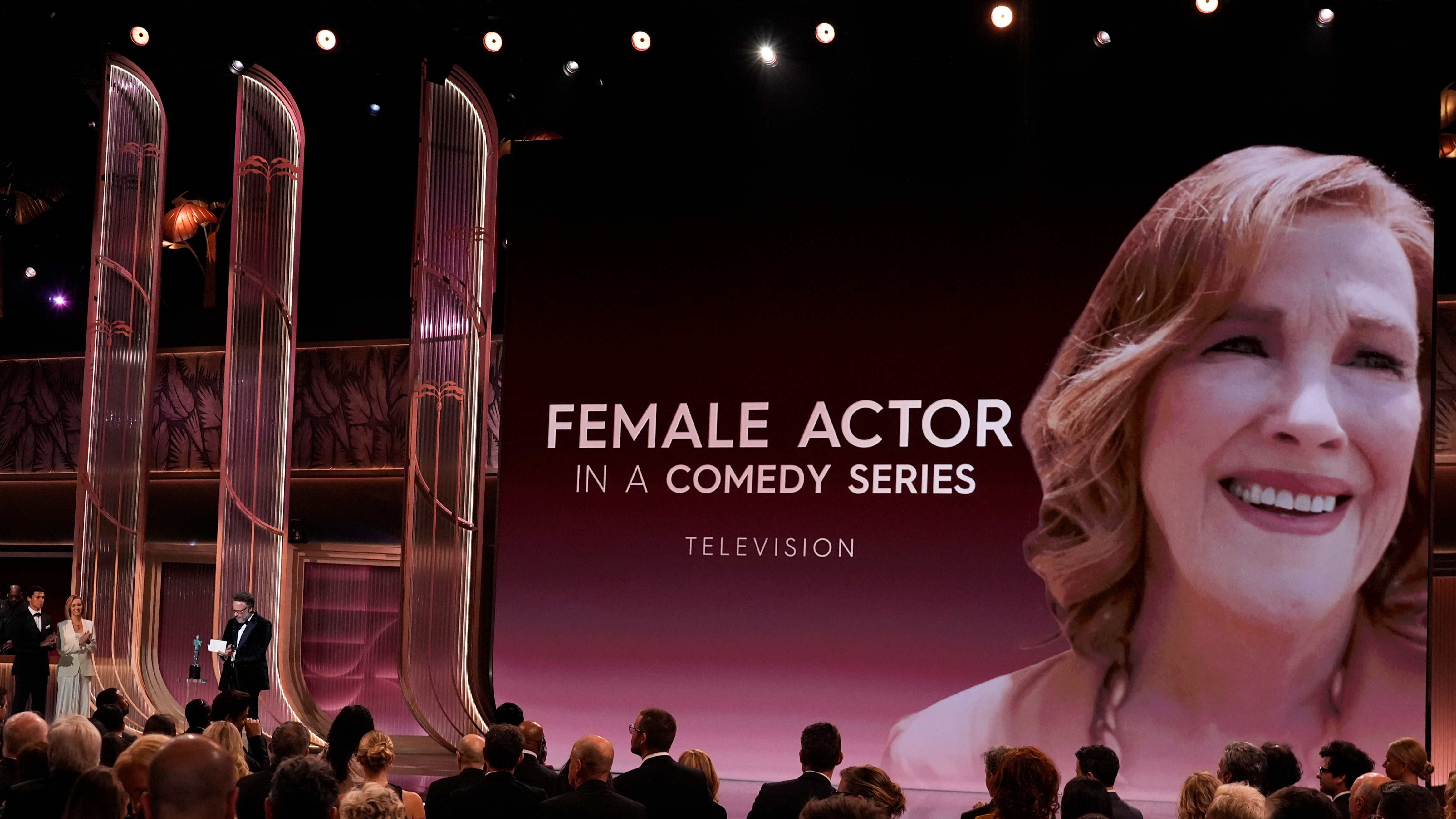 Seth Rogen accepts the award for outstanding performance by a female actor in a comedy series for "The Studio" on behalf of Catherine O'Hara at the Actor Awards on March 1, 2026.
