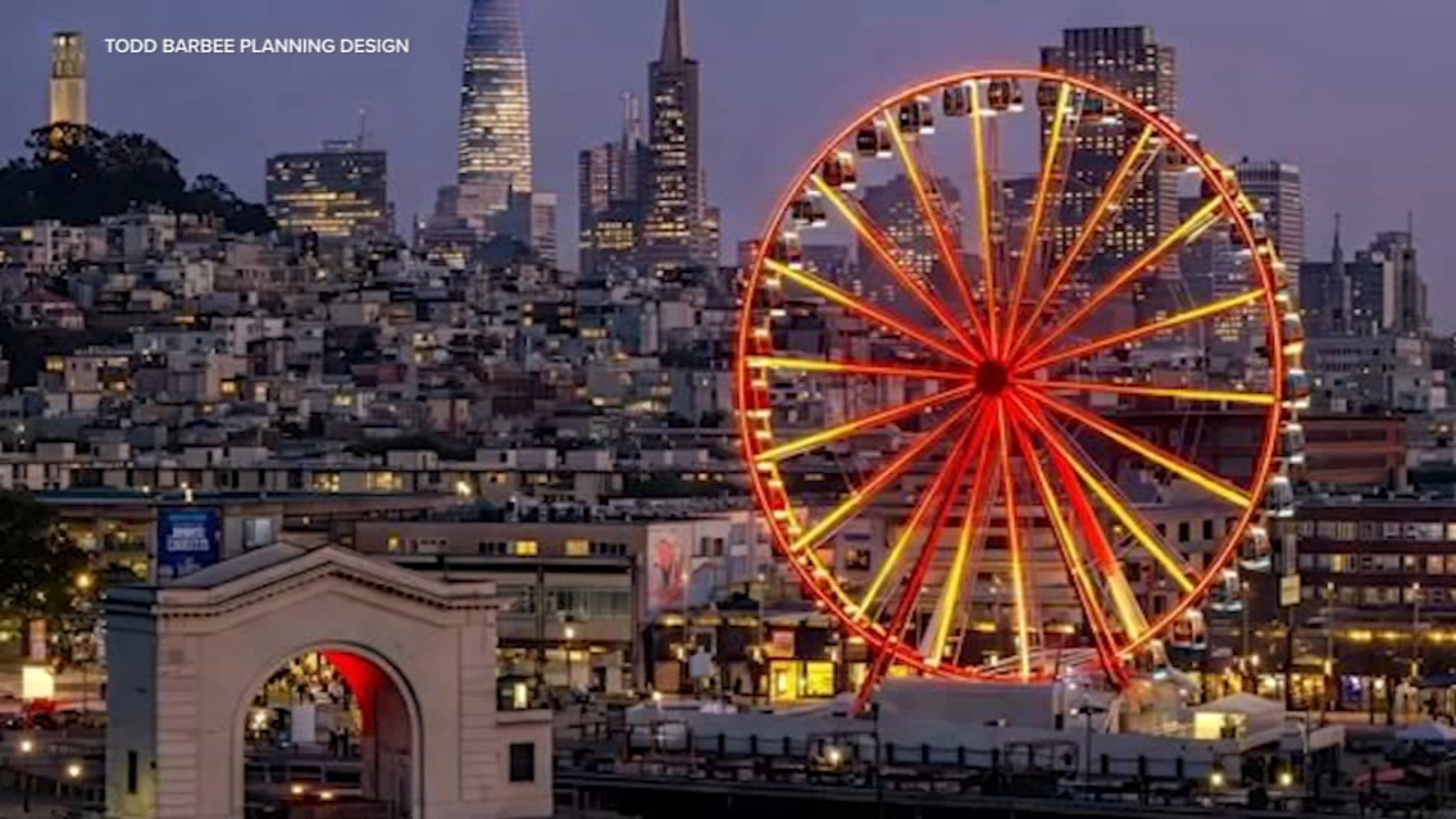 SkyStar Wheel glows red and gold over at SF's Fisherman's Wharf in honor of Chinese New Year Parade