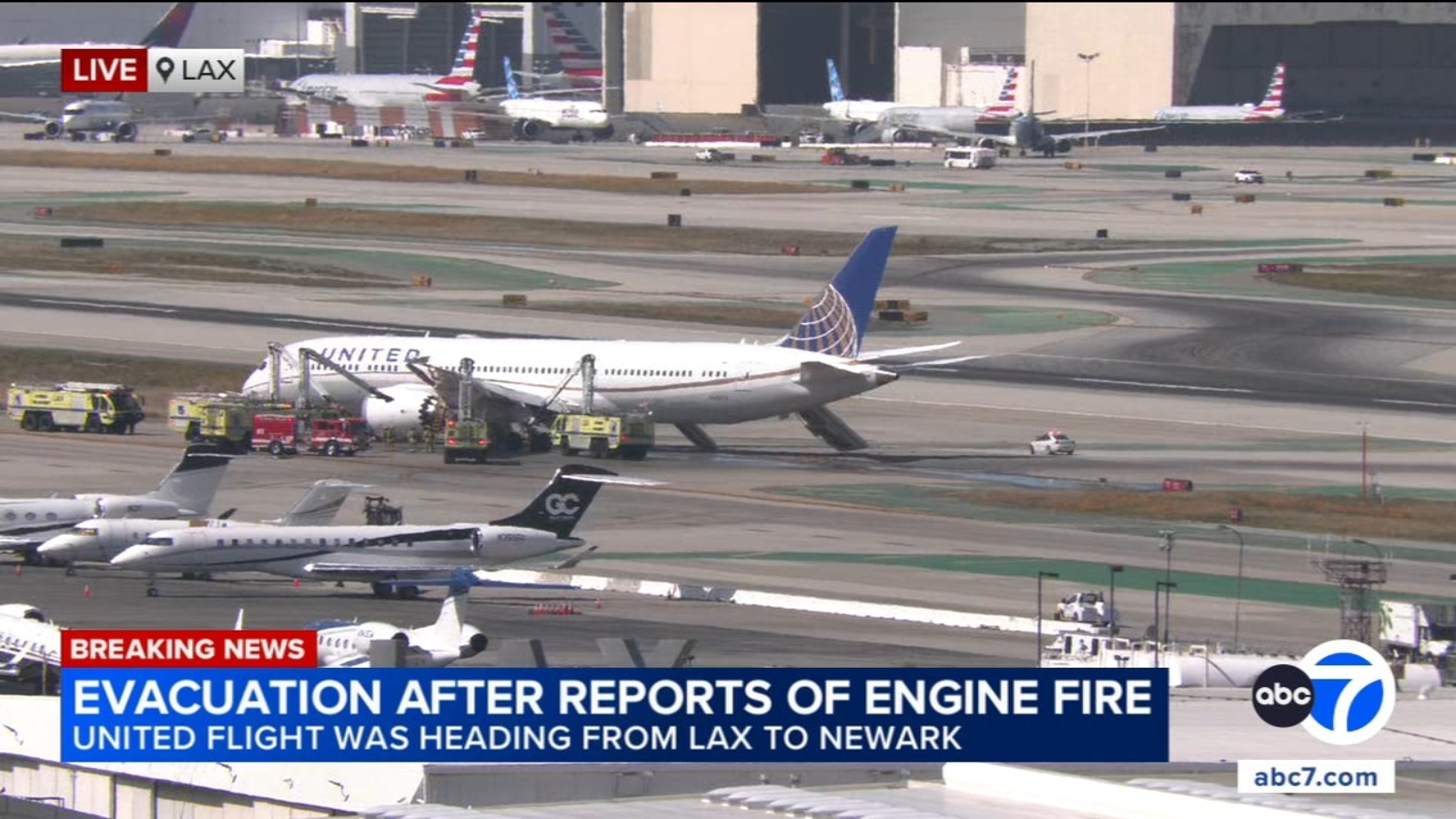 Ground stop issued at LAX after engine issue forces evacuation of United flight Ground stop issued at LAX after engine issue forces evacuation of United flight