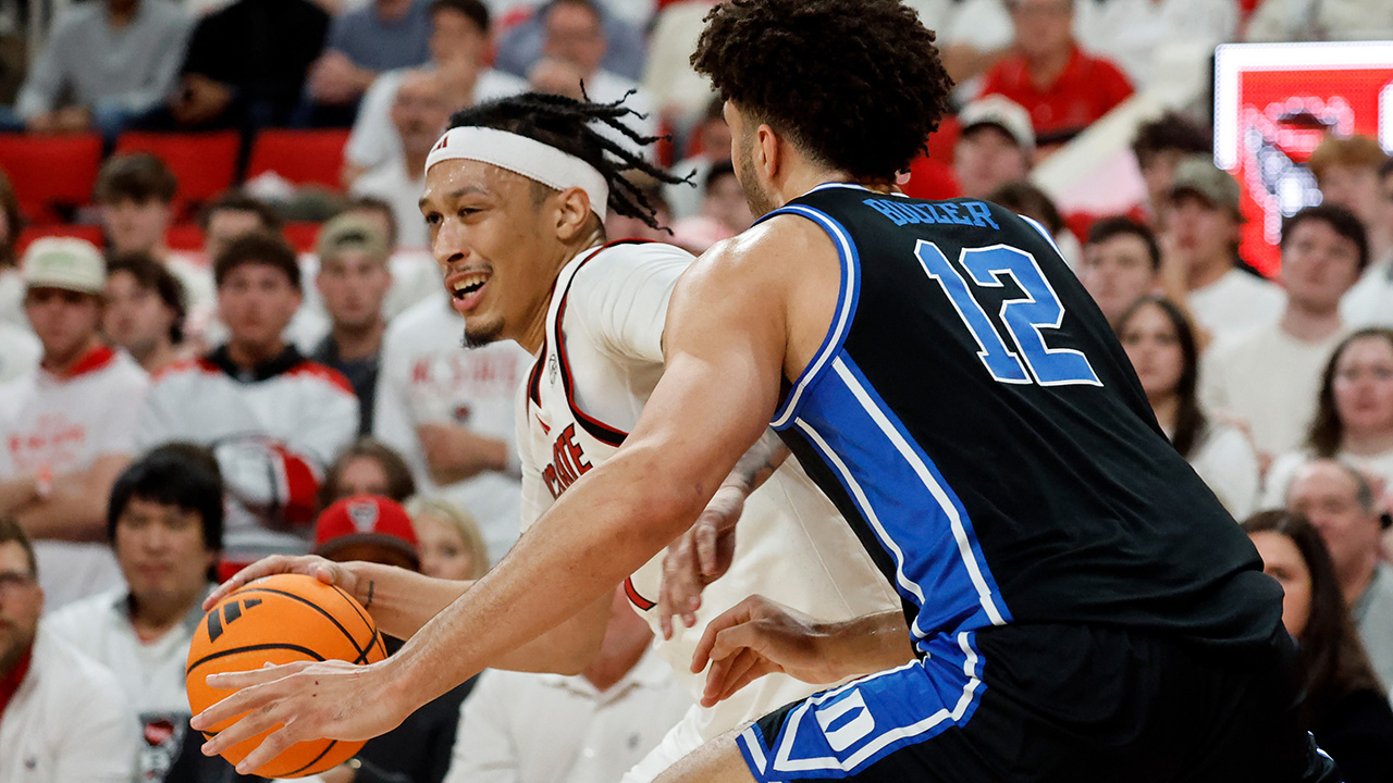 Duke's Cameron Boozer closely guards N.C. State's Darrion Williams on Monday in Raleigh.