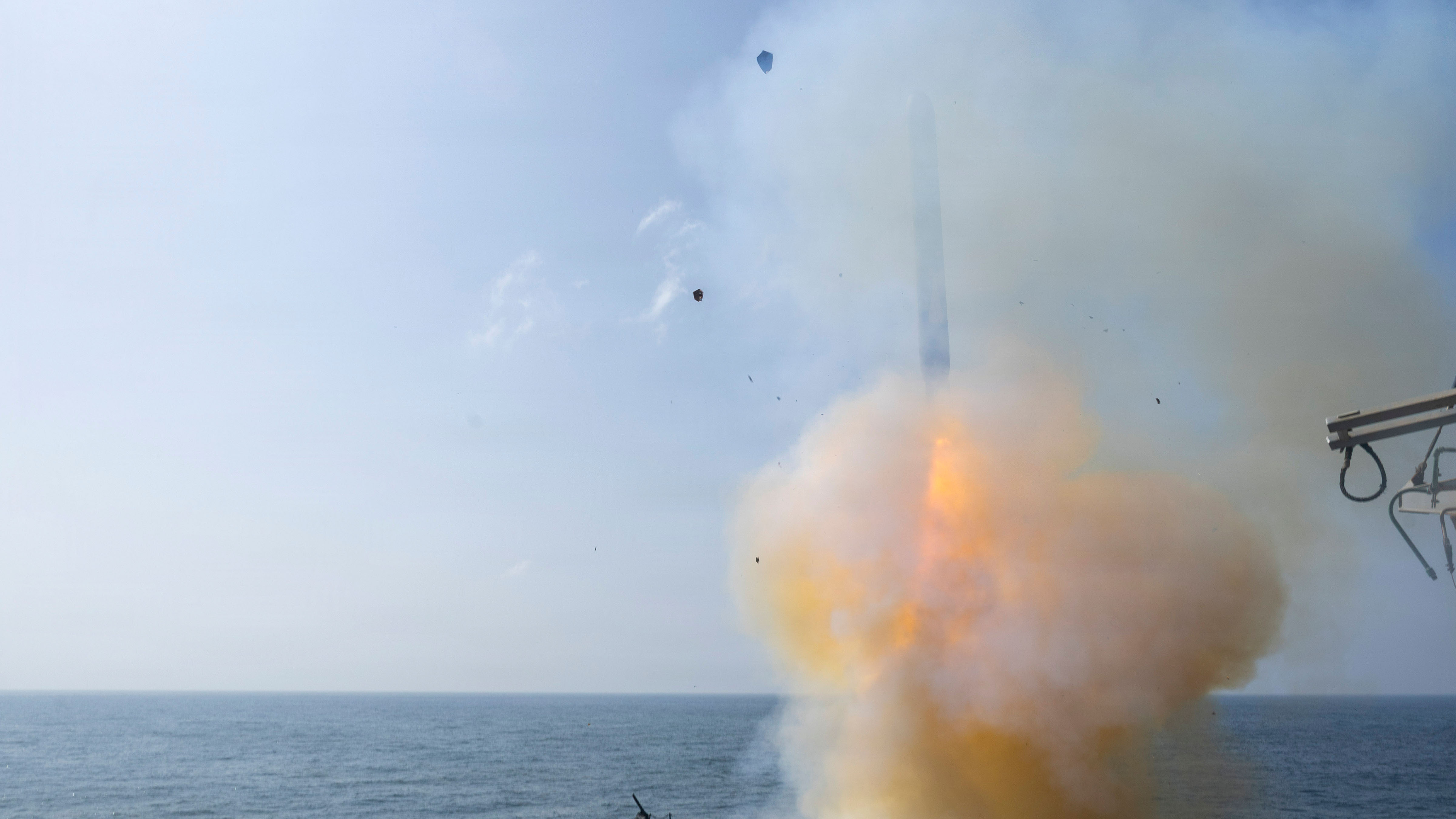 In this handout released by the U.S. Navy, A Tomahawk land attack missile is launched from the Arleigh Burke-class guided-missile destroyer USS Milius.