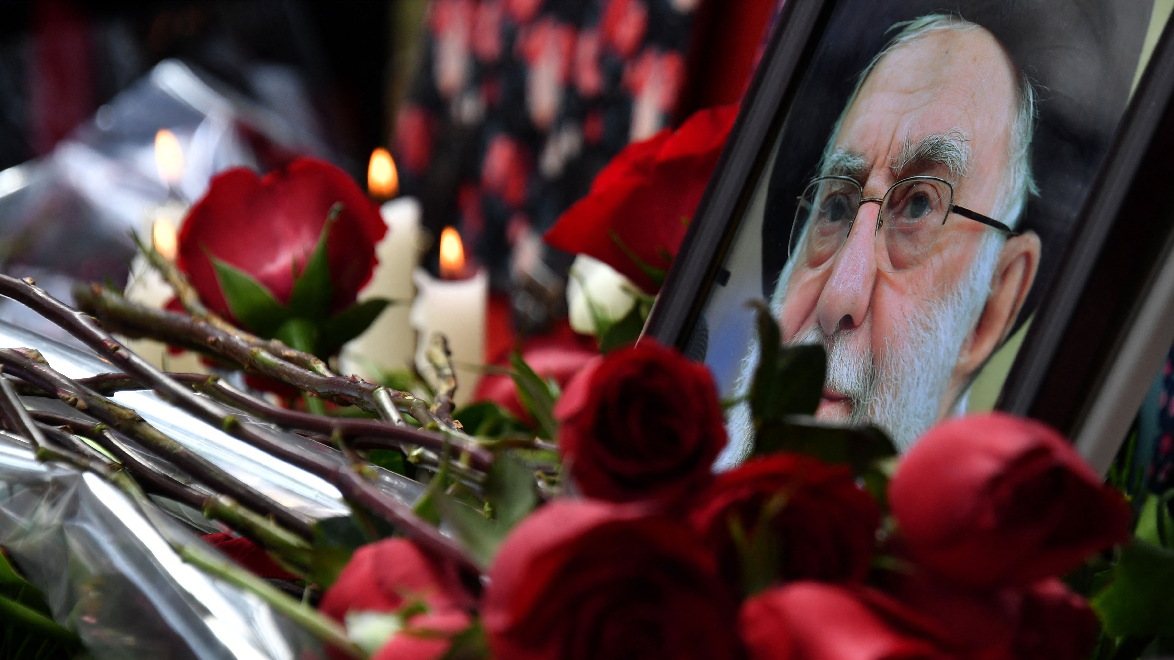 This photograph taken on March 3, 2026, shows a memorial with flowers and a portrait of late Iran's supreme leader Ayatollah Ali Khamenei outside the Iranian Embassy in Bishkek.