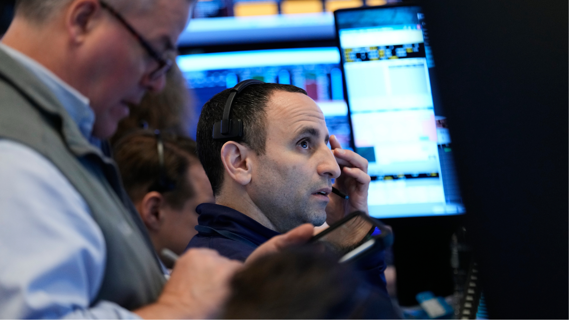 Traders work on the floor at the New York Stock Exchange in New York, Thursday, March 5, 2026.