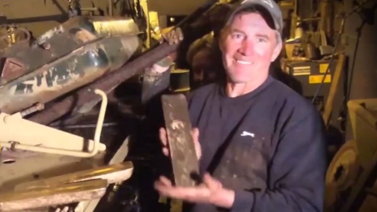 Men find $1.4 million in gold shoved inside tank