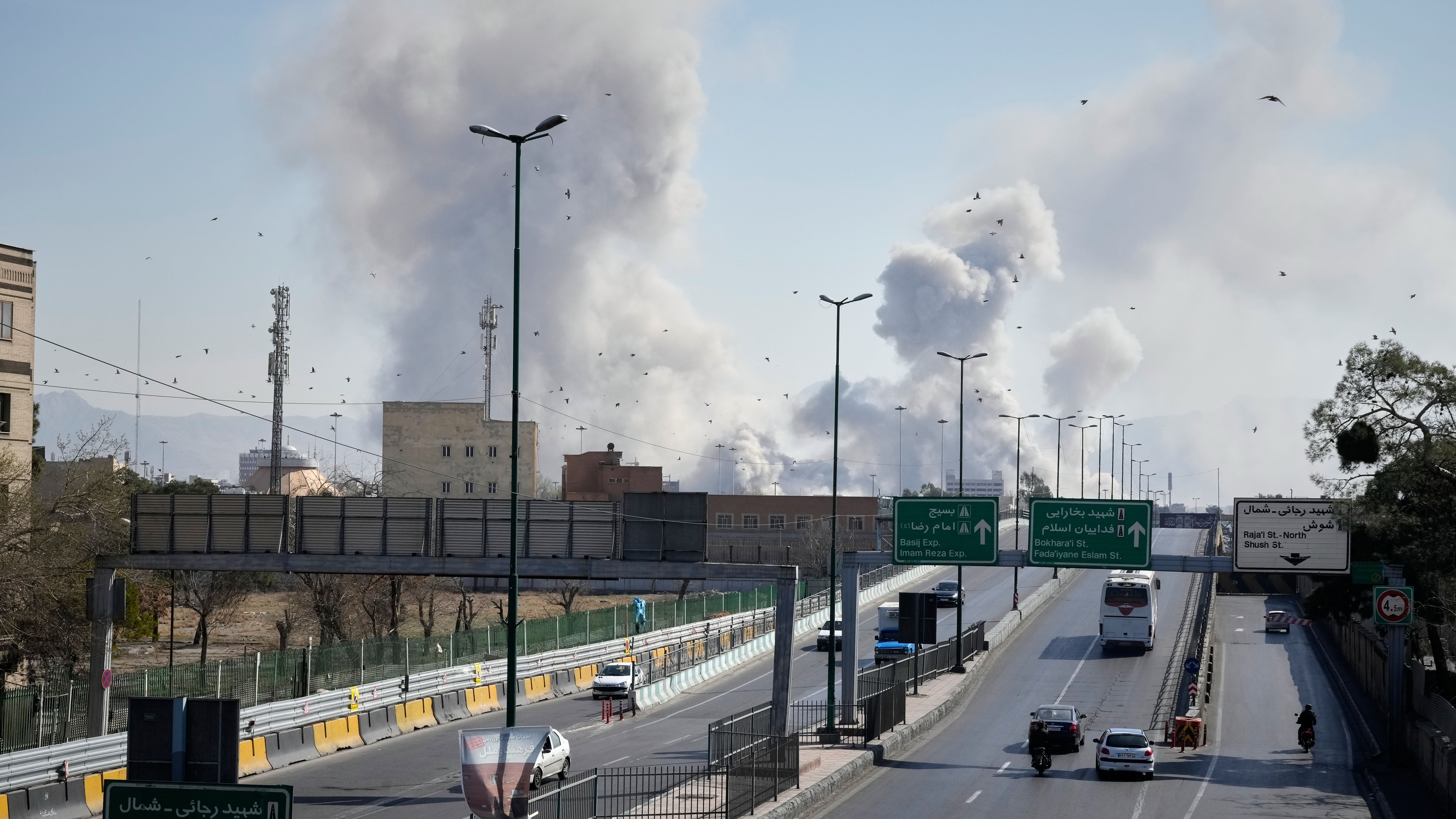 Plumes of smoke rise as strikes hit the city during the U.S.-Israeli military campaign in Tehran, Iran, Thursday, March 5, 2026.