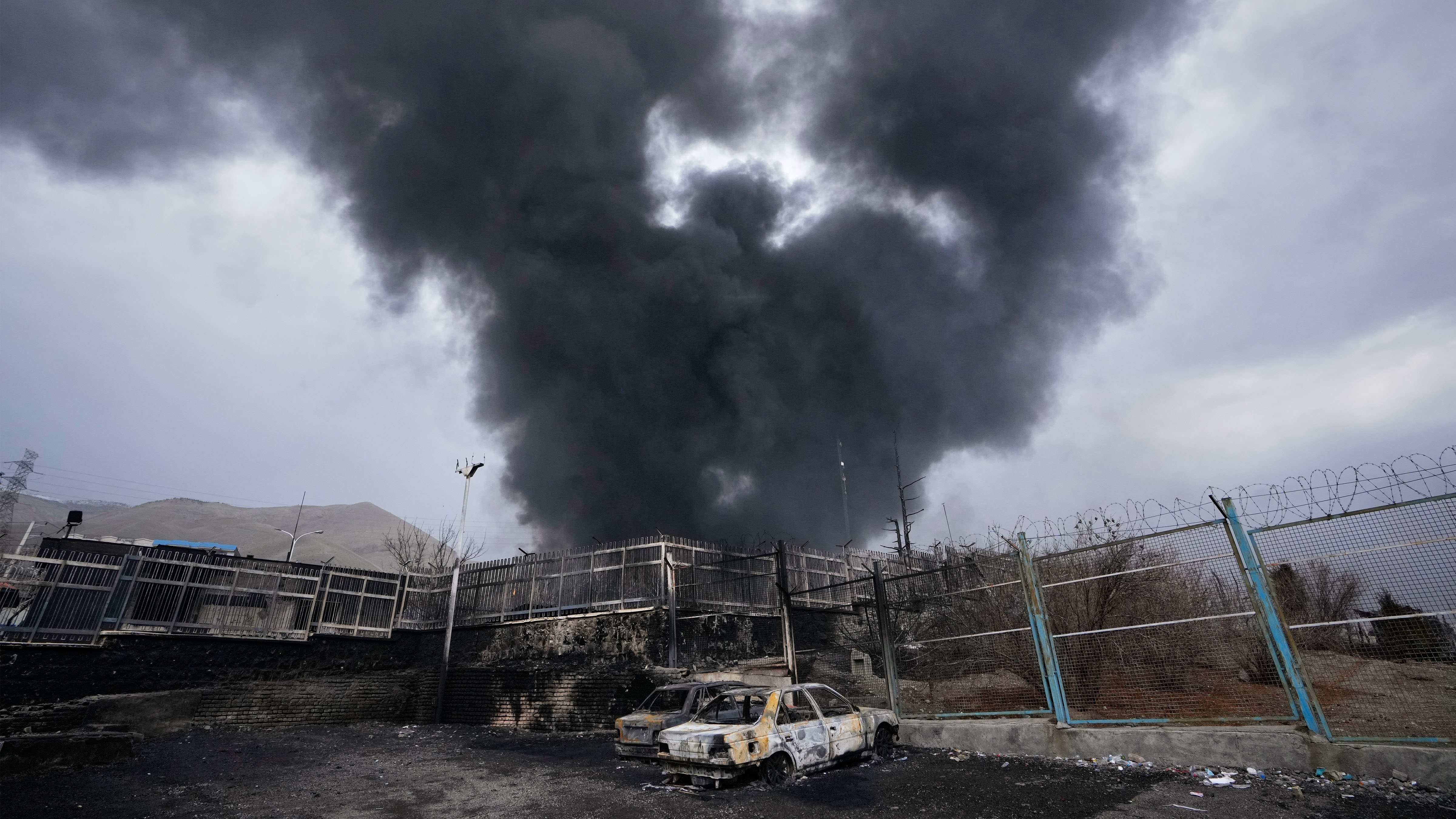 A heavy plume of fume rises from an lipid retention installation deed by a U.S.-Israeli onslaught precocious Saturday successful Tehran, Iran, Sunday, March 8, 2026.