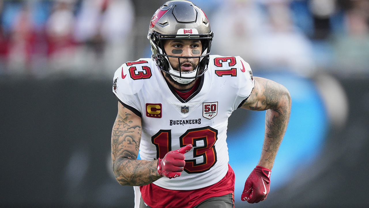 FILE - Tampa Bay Buccaneers wide receiver Mike Evans runs during an NFL football game between the Carolina Panthers and the Tampa Bay Buccaneers on Dec. 21, 2025, in Charlotte, N.C.