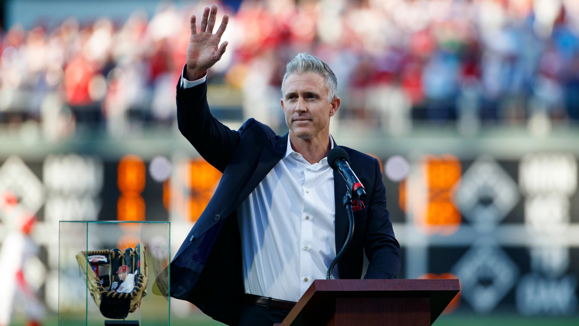Chase Utley reacts during a retirement ceremony before a baseball game between the Phillies and the Marlins, Friday, June 21, 2019.