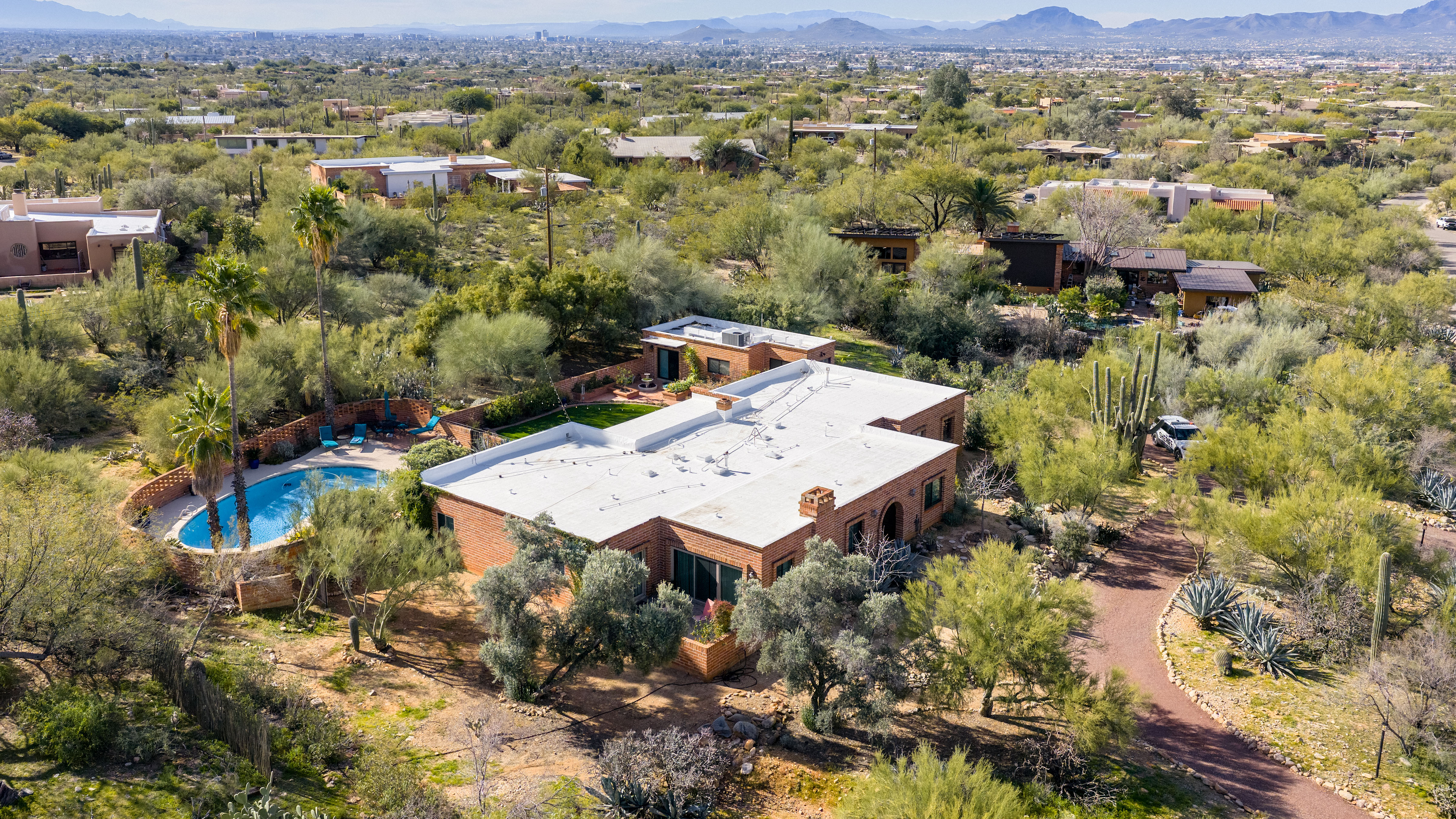 In an aerial view, Nancy Guthrie's residence is seen on February 15, 2026 in Tuscon, Arizona.