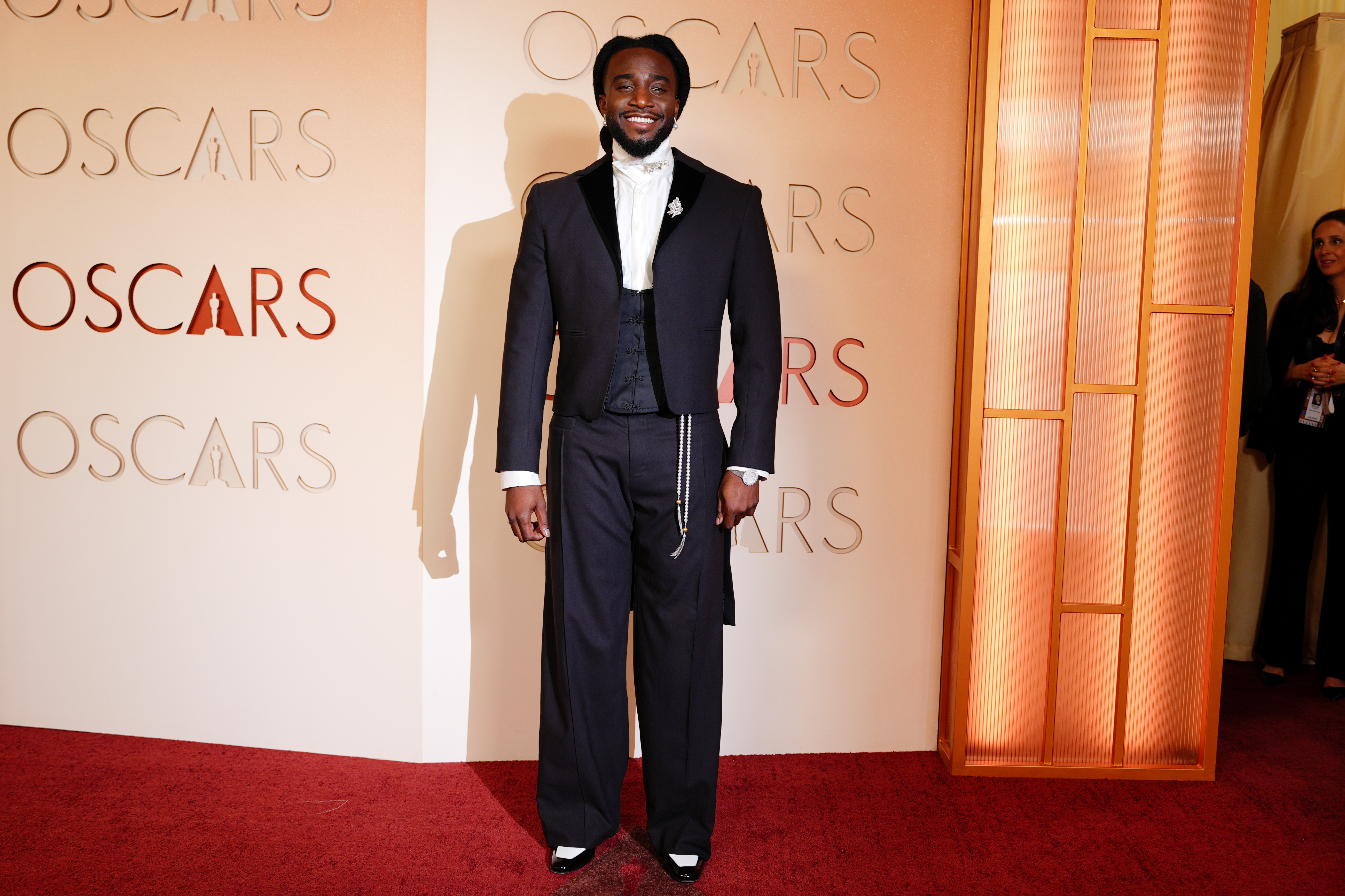 Shaboozey arrives at the Oscars on Sunday, March 15, 2026, at the Dolby Theatre in Los Angeles.