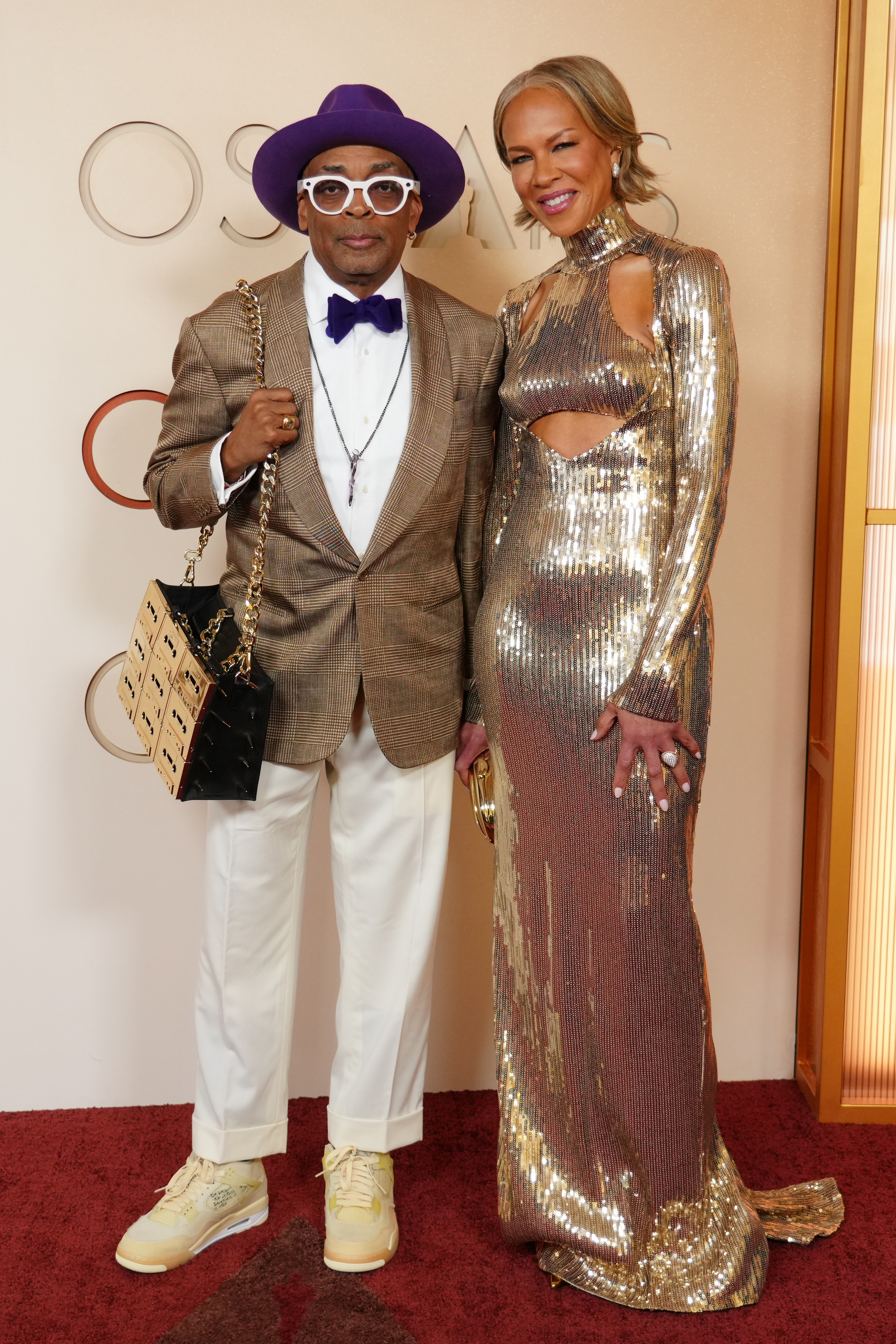 Spike Lee, left, and Tonya Lewis Lee arrive at the Oscars on Sunday, March 15, 2026, at the Dolby Theatre in Los Angeles.