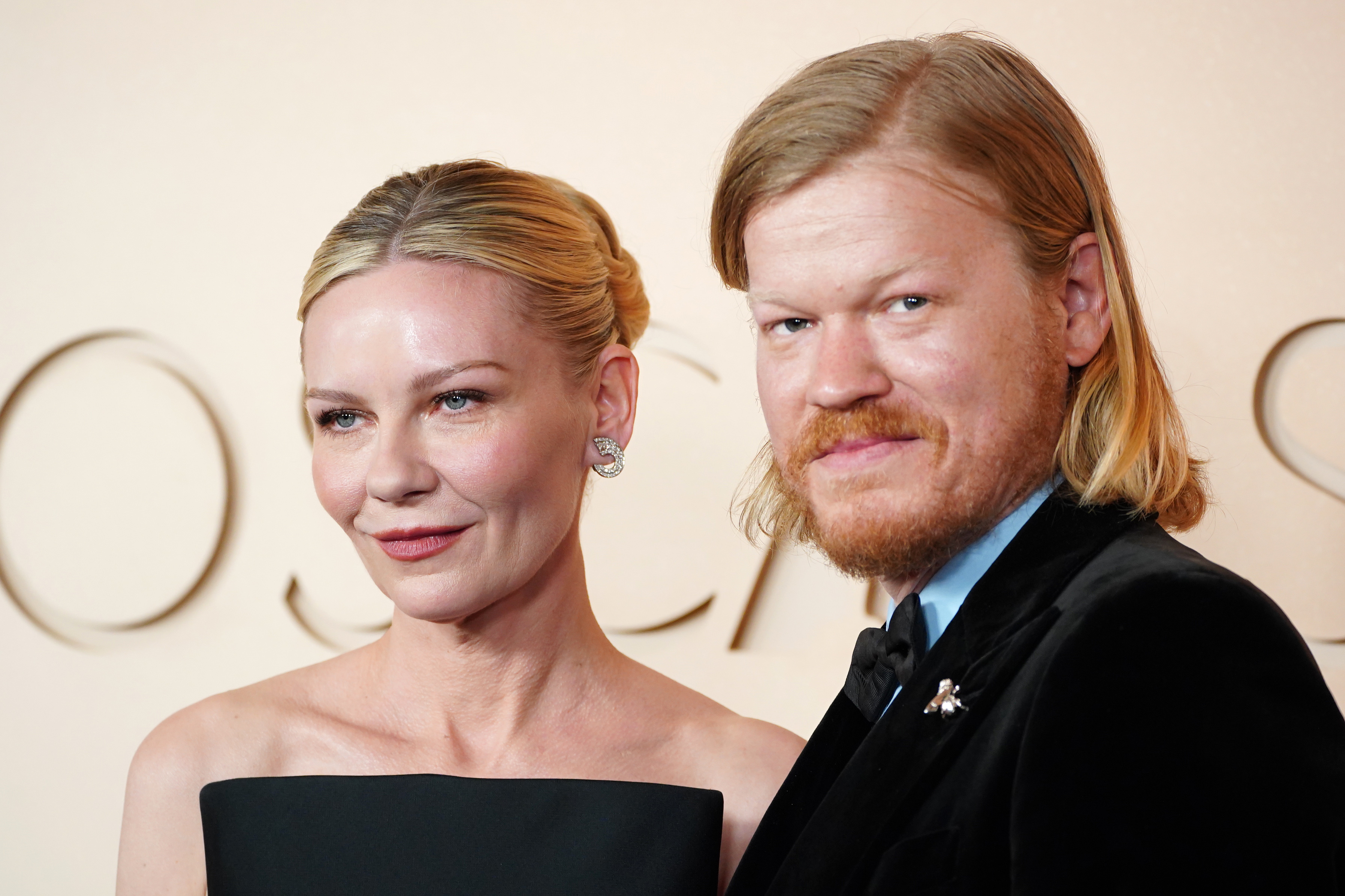 Kirsten Dunst, left, and Jesse Plemons arrive at the Oscars on Sunday, March 15, 2026, at the Dolby Theatre in Los Angeles.