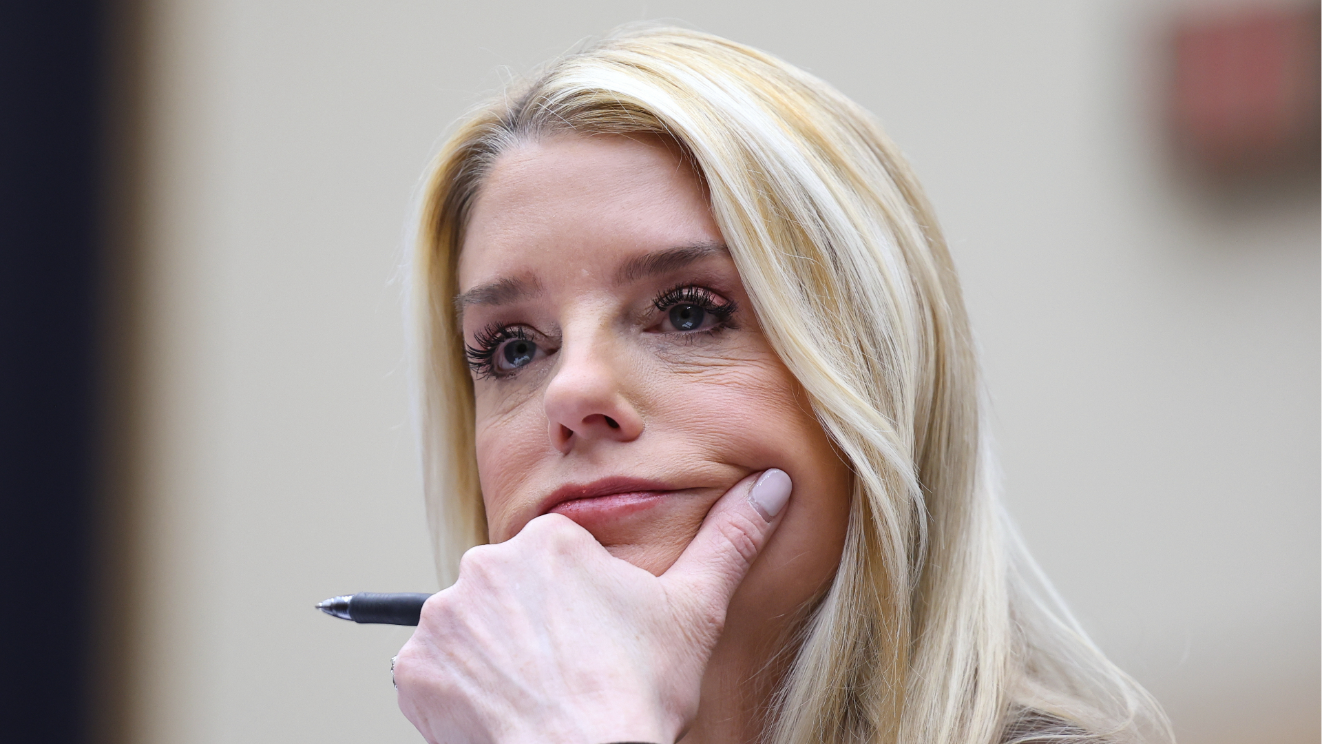 FILE - Attorney General Pam Bondi listens as she testifies before a House Judiciary Committee oversight hearing on Capitol Hill in Washington, Feb. 11, 2026, in Washington. 