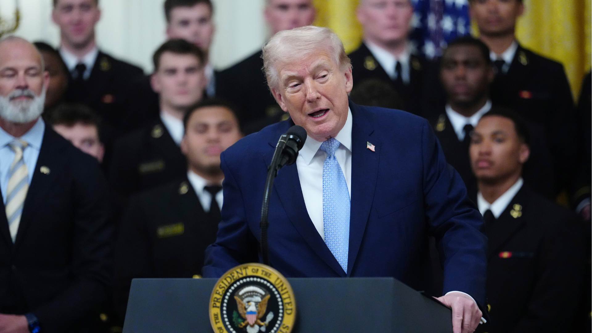 President Donald Trump speaks during the Commander-in-Chief's Trophy presentation with the Navy Midshipmen football team at the White House, Friday, March 20, 2026, in Washington.