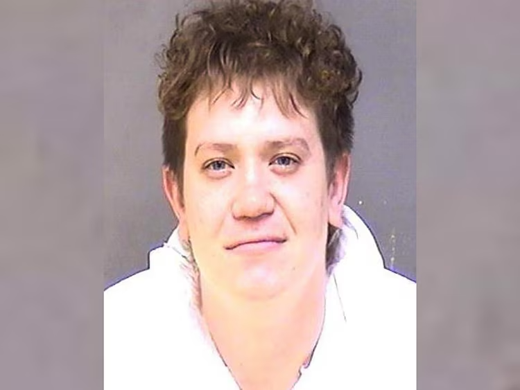 Dayton James Webber is seen in a booking photo.