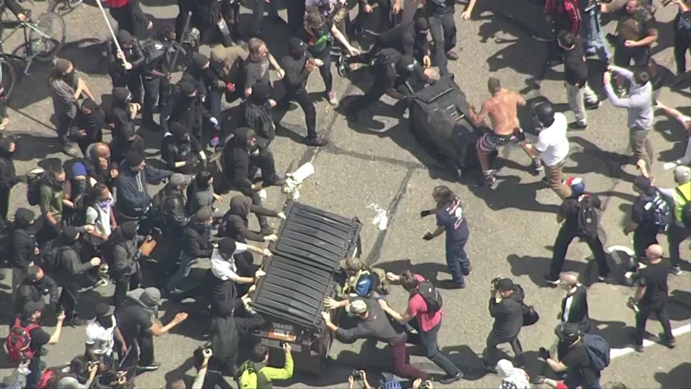 Protesters clash violently in Berkeley over Pres. Trump