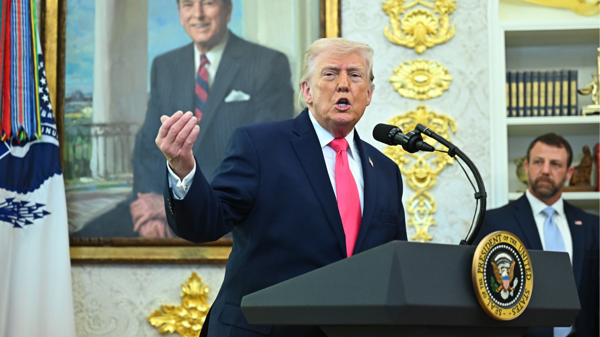 Markwayne Mullin, right, watches arsenic  President Donald Trump speaks during a swearing-in ceremonial  successful  the Oval Office of the White House successful  Washington, DC, connected  Tuesday, March 24, 2026.