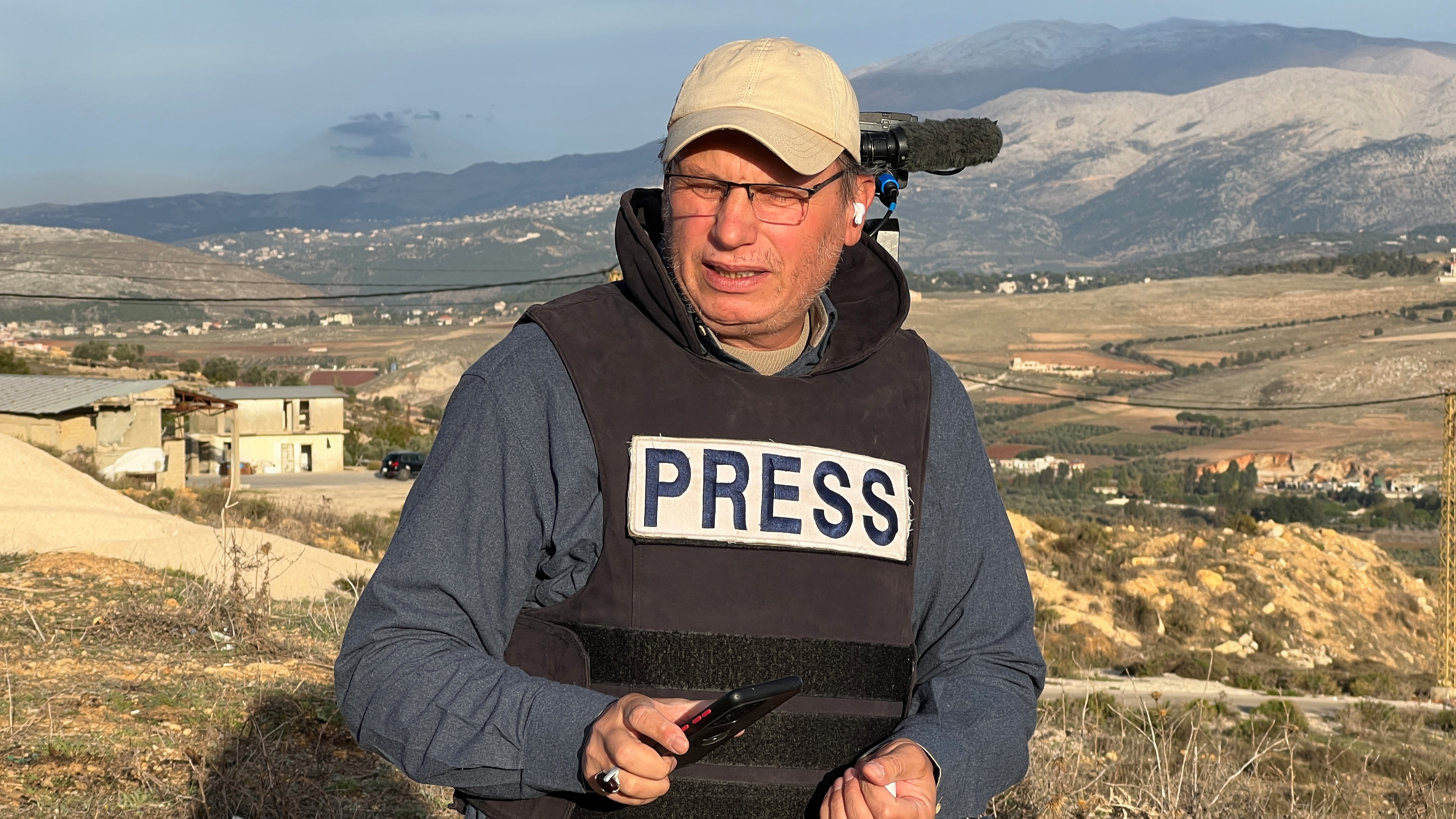 Hezbollah's al-Manar TV correspondent Ali Shoeib, who was killed in an Israeli strike in Jezzine along with other journalists on Saturday, March 28, 2026, reports in 2024.