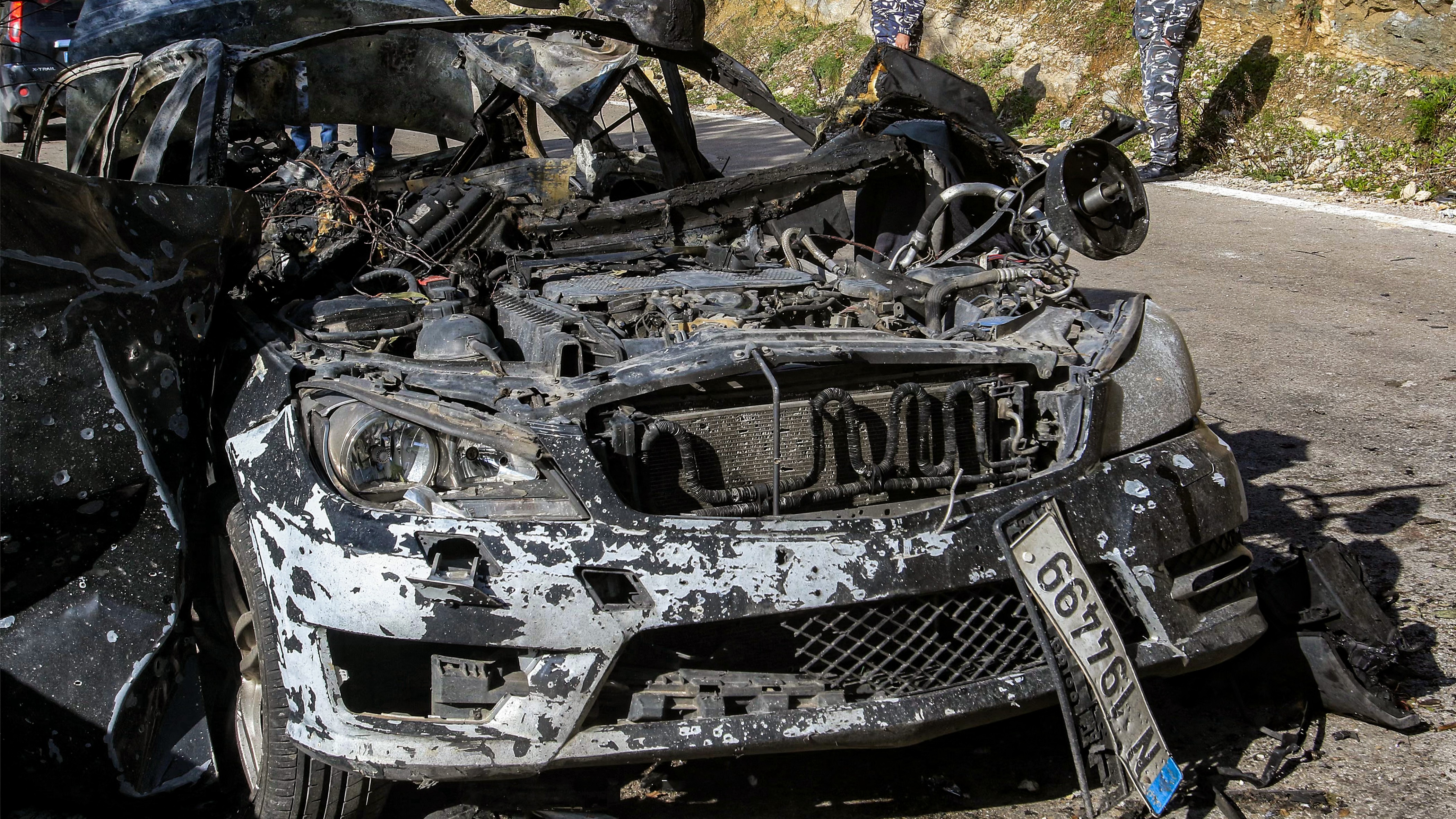 The husk of a destroyed vehicle that was used by a media crew of journalists who were killed in an Isareli strike earlier is pictured in Lebanon on March 28, 2026.