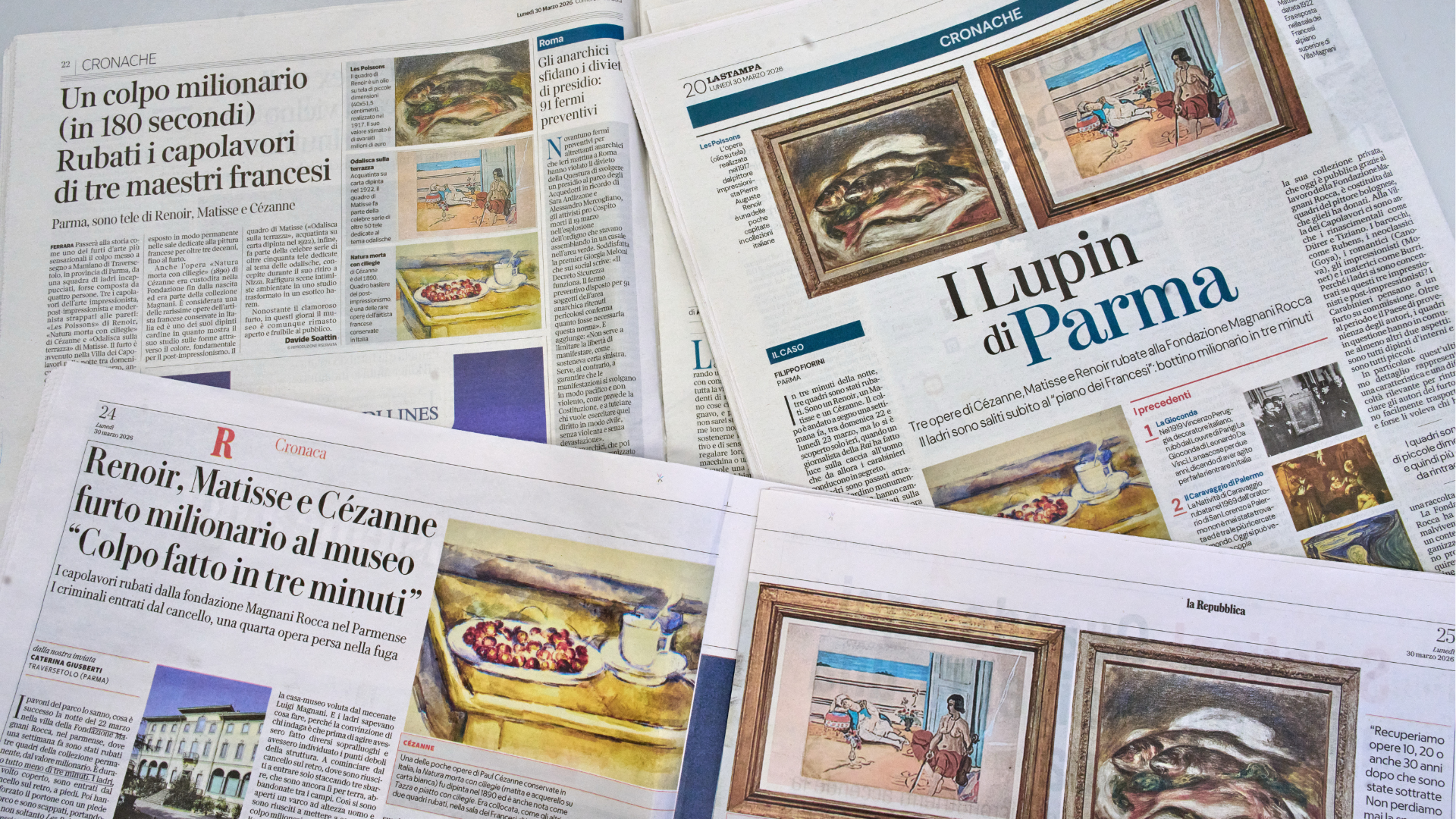 Italian Newspapers carry the news of the heist of three paintings, "Fish" by Auguste Renoir, "Still Life with Cherries" by Paul Cézanne, and "Odalisque on the Terrace" by Henri Matisse, from a museum near Parma, northern Italy, Monday, March 30, 2026.