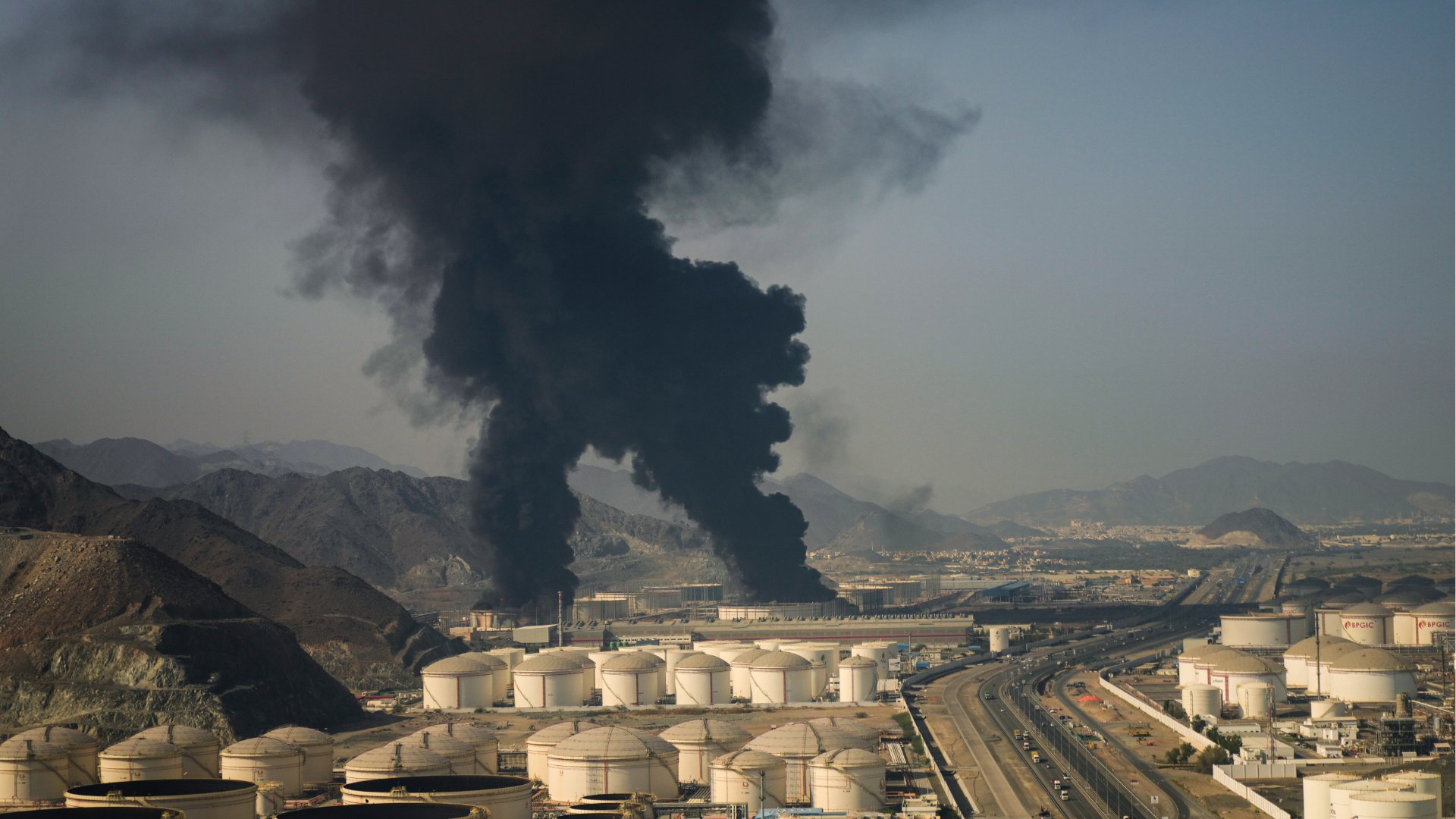 Plumes of smoke rise from an oil facility in Fujairah, United Arab Emirates, Saturday, March 14, 2026.