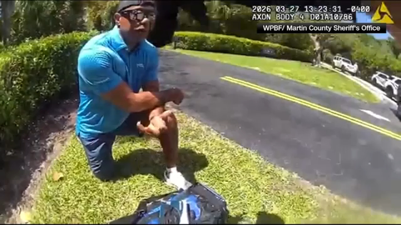 Bodycam shows a stunned Tiger Woods handcuffed after a Florida rollover crash