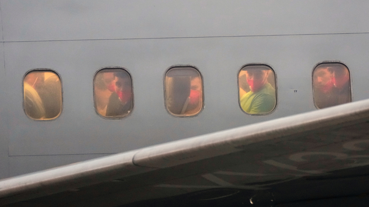 FILE - Migrants deported months ago by the U.S. to El Salvador under the Trump administration's immigration crackdown arrive in Maiquetia, Venezuela, July 18, 2025.