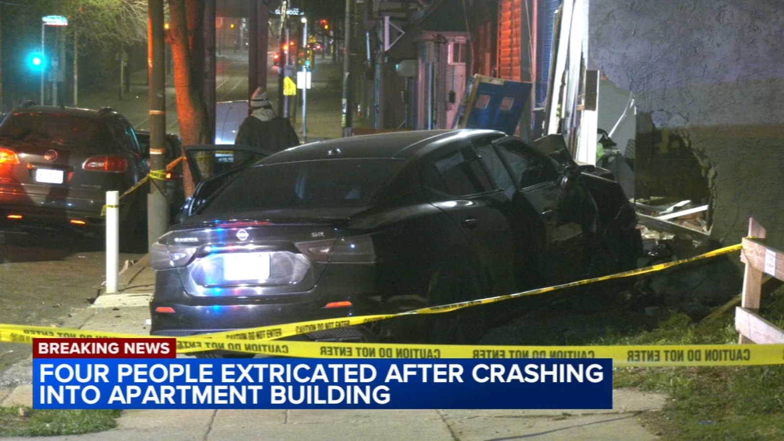 4 people rescued after car crashes into apartment building in Germantown