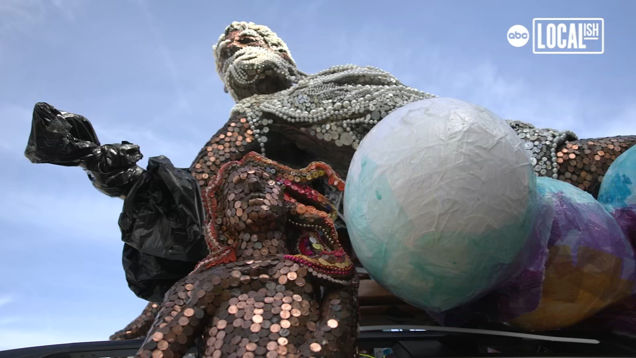 "Renaissance on Wheels" rolling in the Art Car Parade