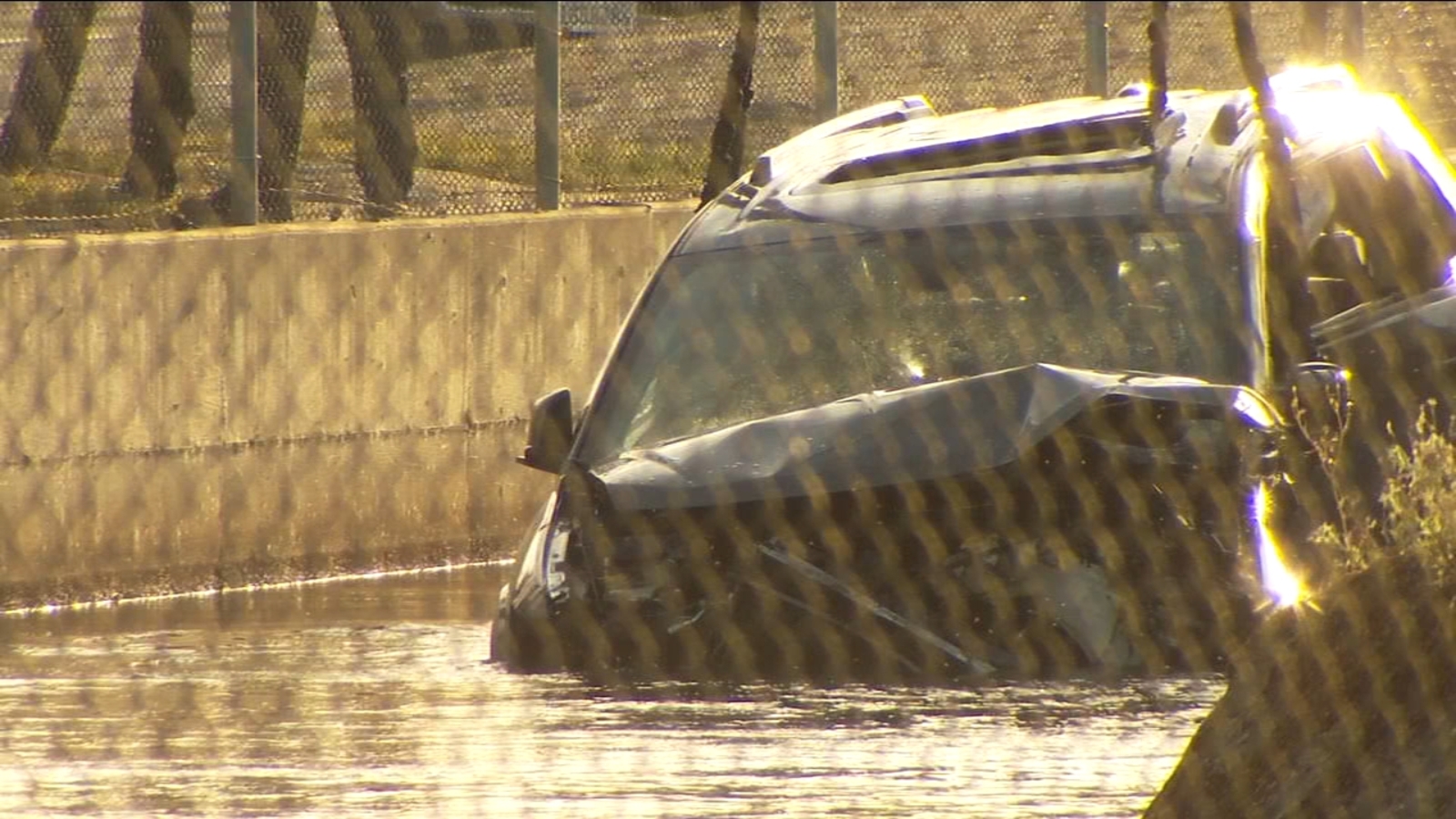 Woman and 9-year-old son dead after crash that sent car into canal in ...