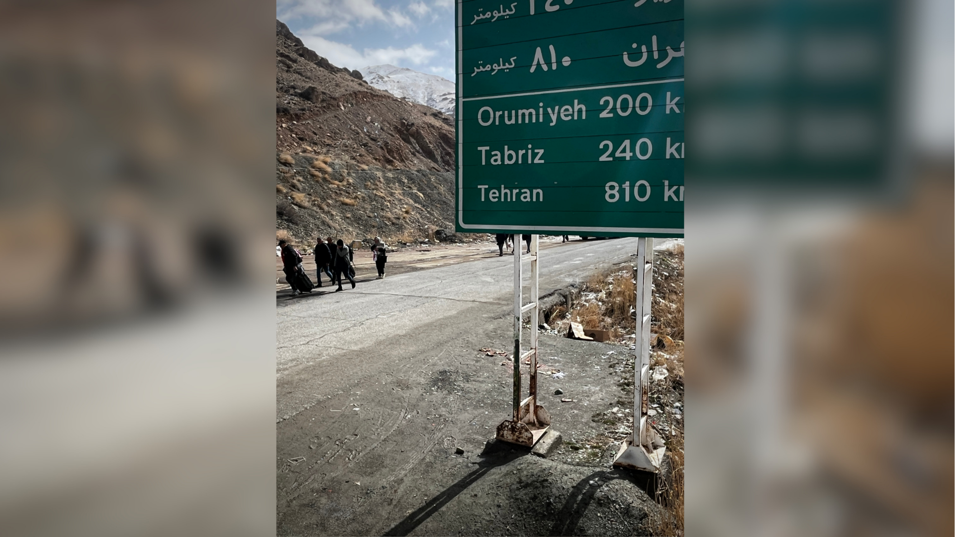 Travelers arrive at a border crossing between Turkey and Iran in Razi, Iran, Saturday, April 4, 2026.