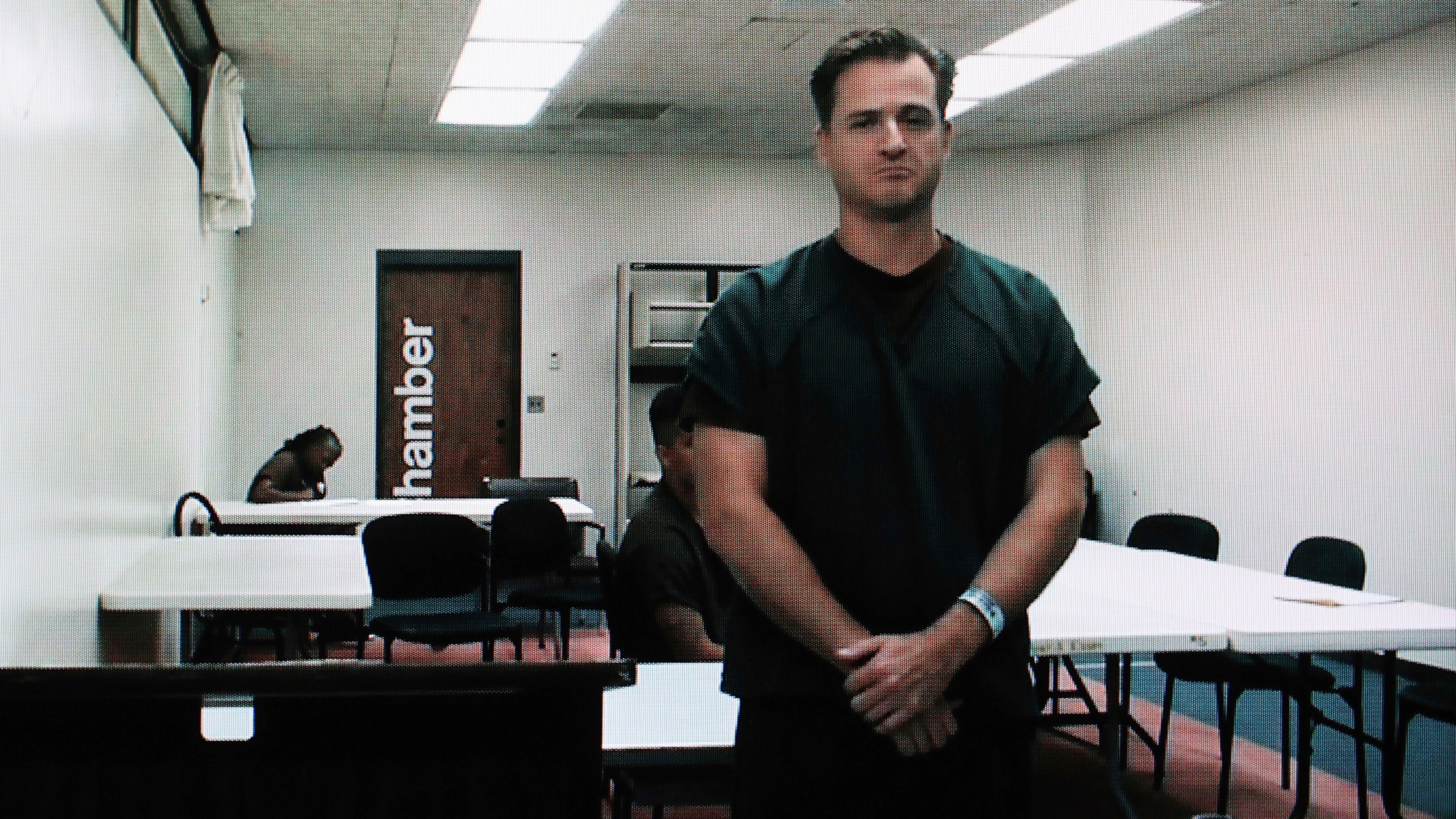 Hawaii doctor Gerhardt Konig appears before a judge via video during an arraignment hearing after being indicted on allegation of attempting to kill his wife, April 7, 2025, in Honolulu.