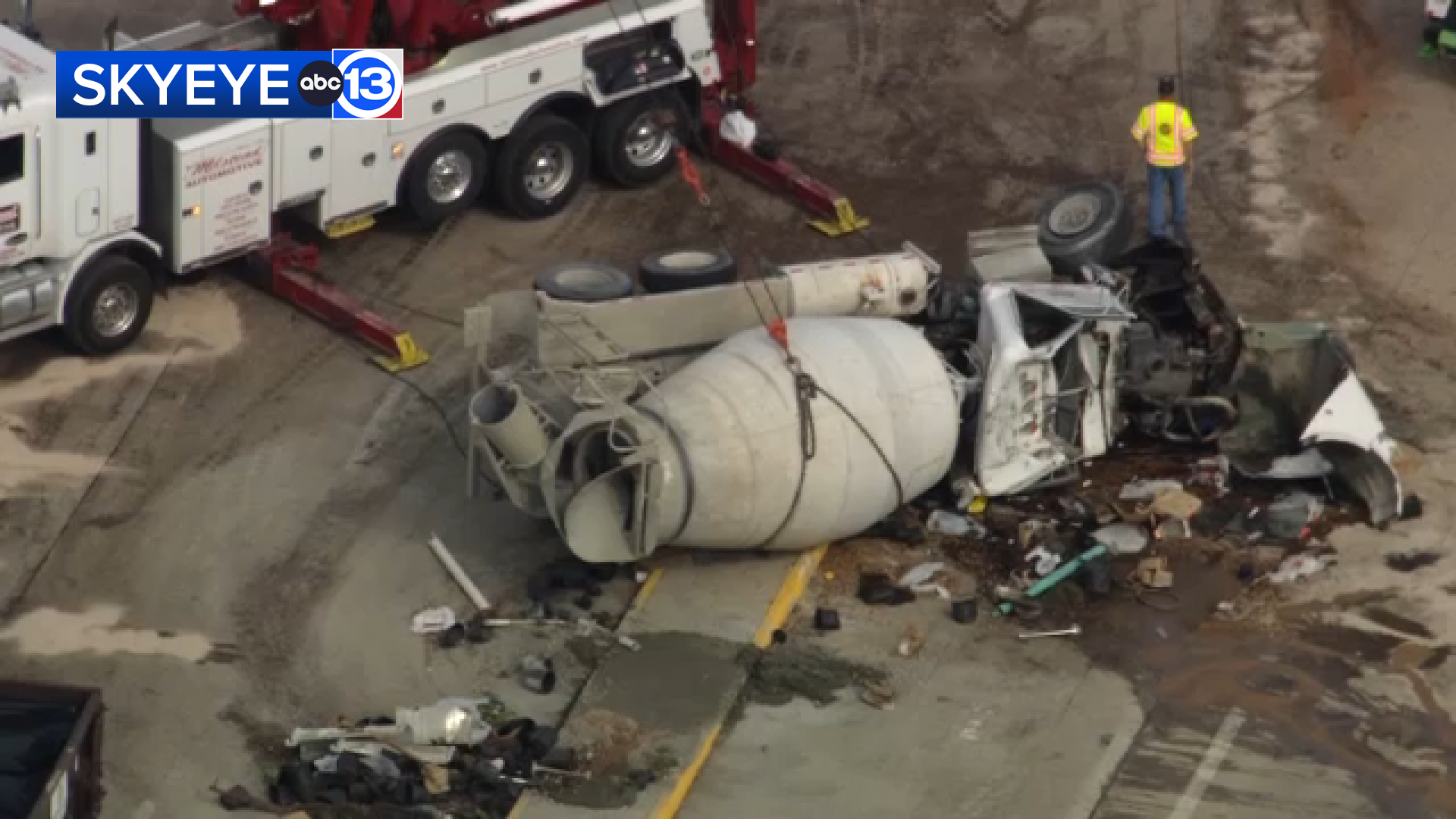 TxDOT said crews were working to lift a concrete mixer off its side after a crash in Montgomery County.