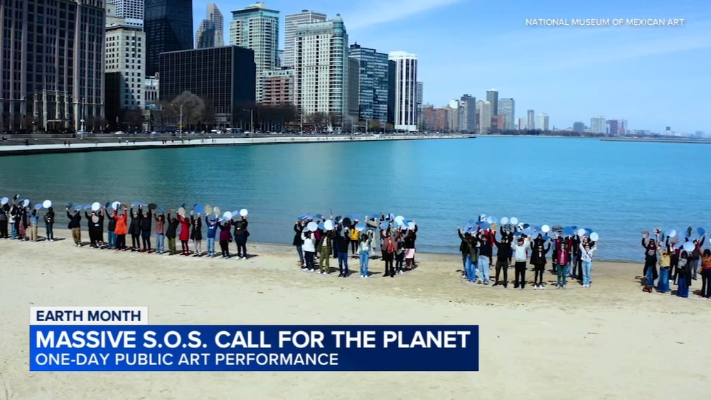 'Speaking in light:' Artist leads massive SOS call for the planet